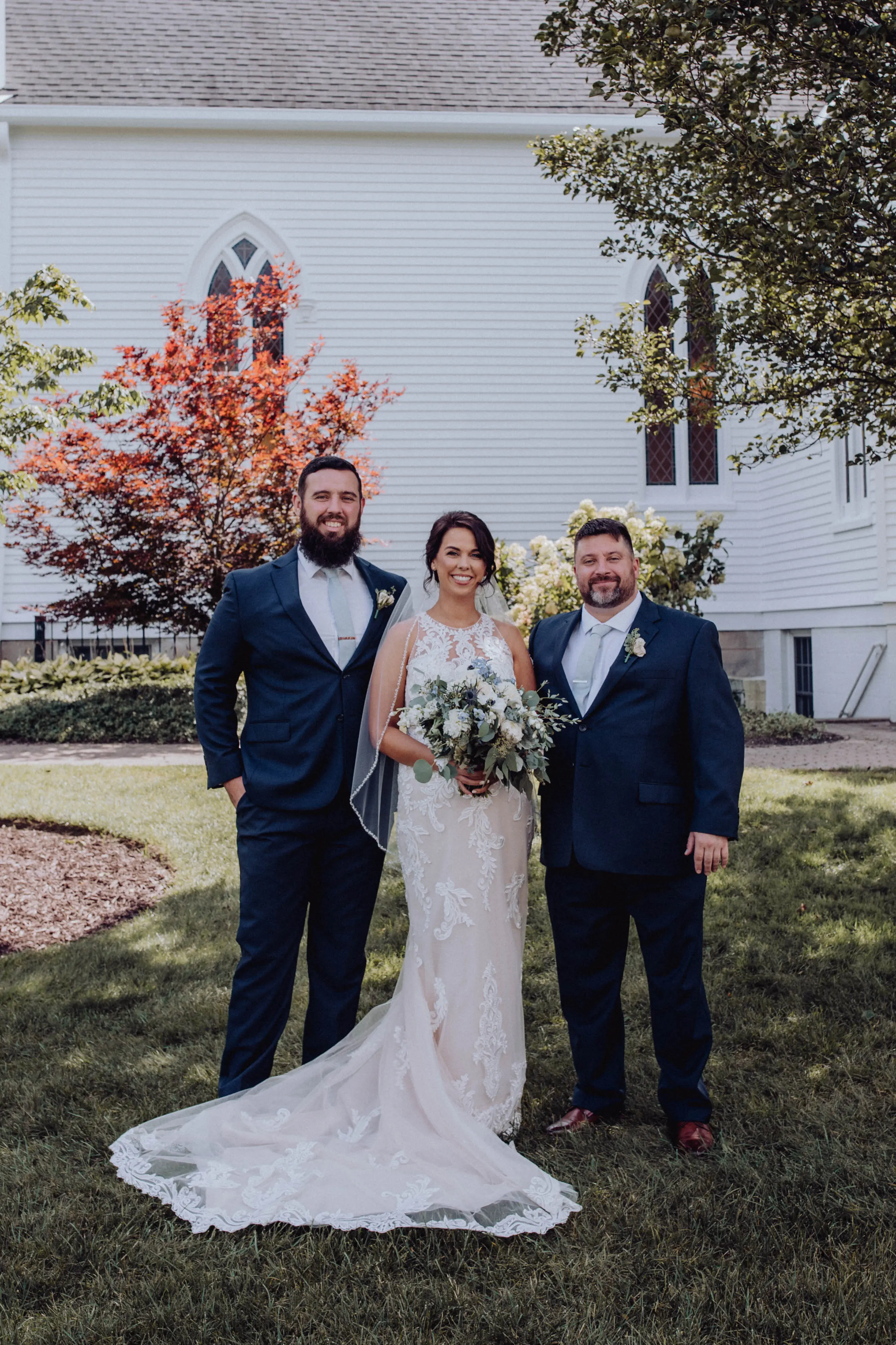 Bride wearing budget friendly fit and flare wedding dress