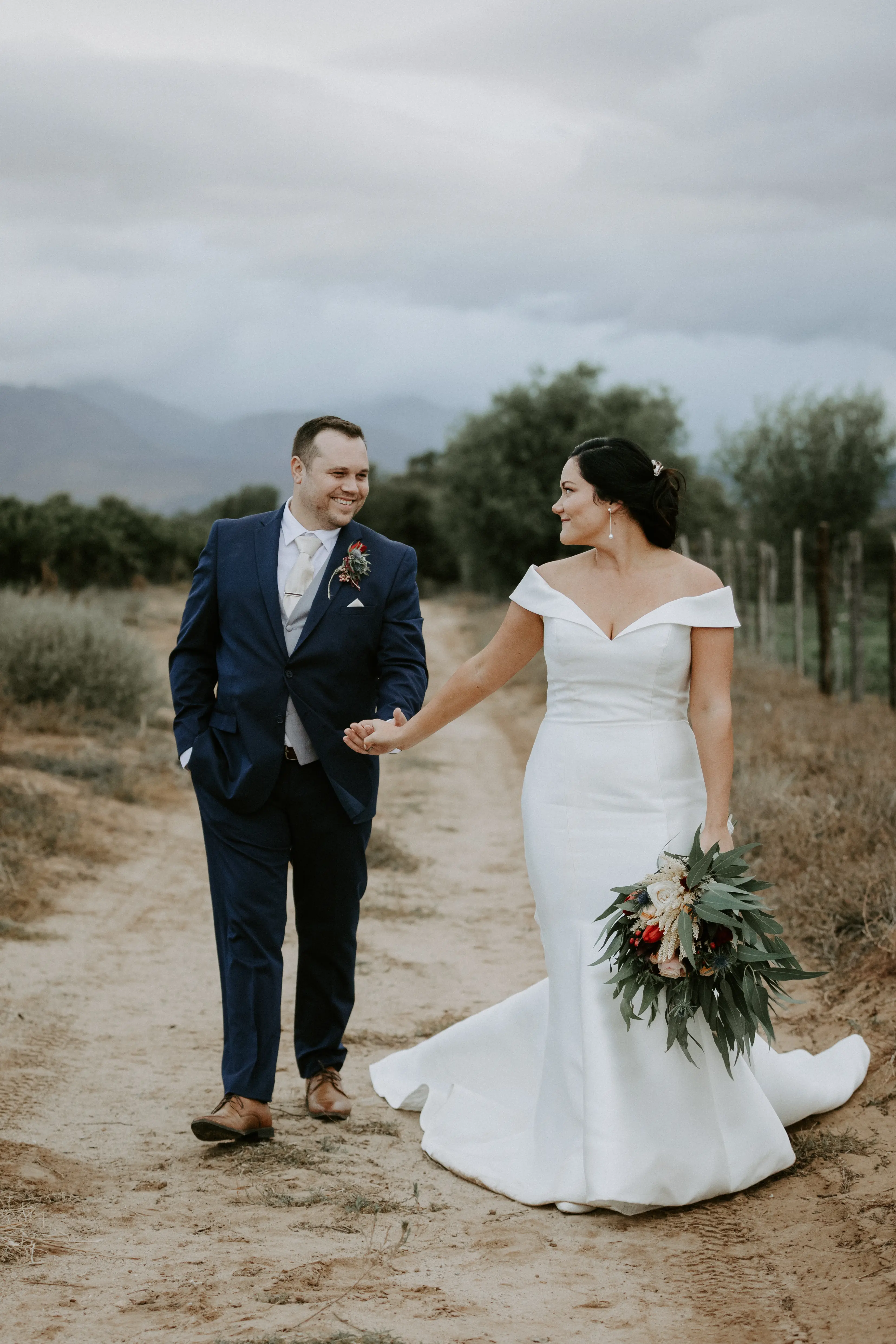 Groom With Bride Wearing Vintage Off The Shoulder Fit-And-Flare Wedding Dress Josie By Rebecca Ingram