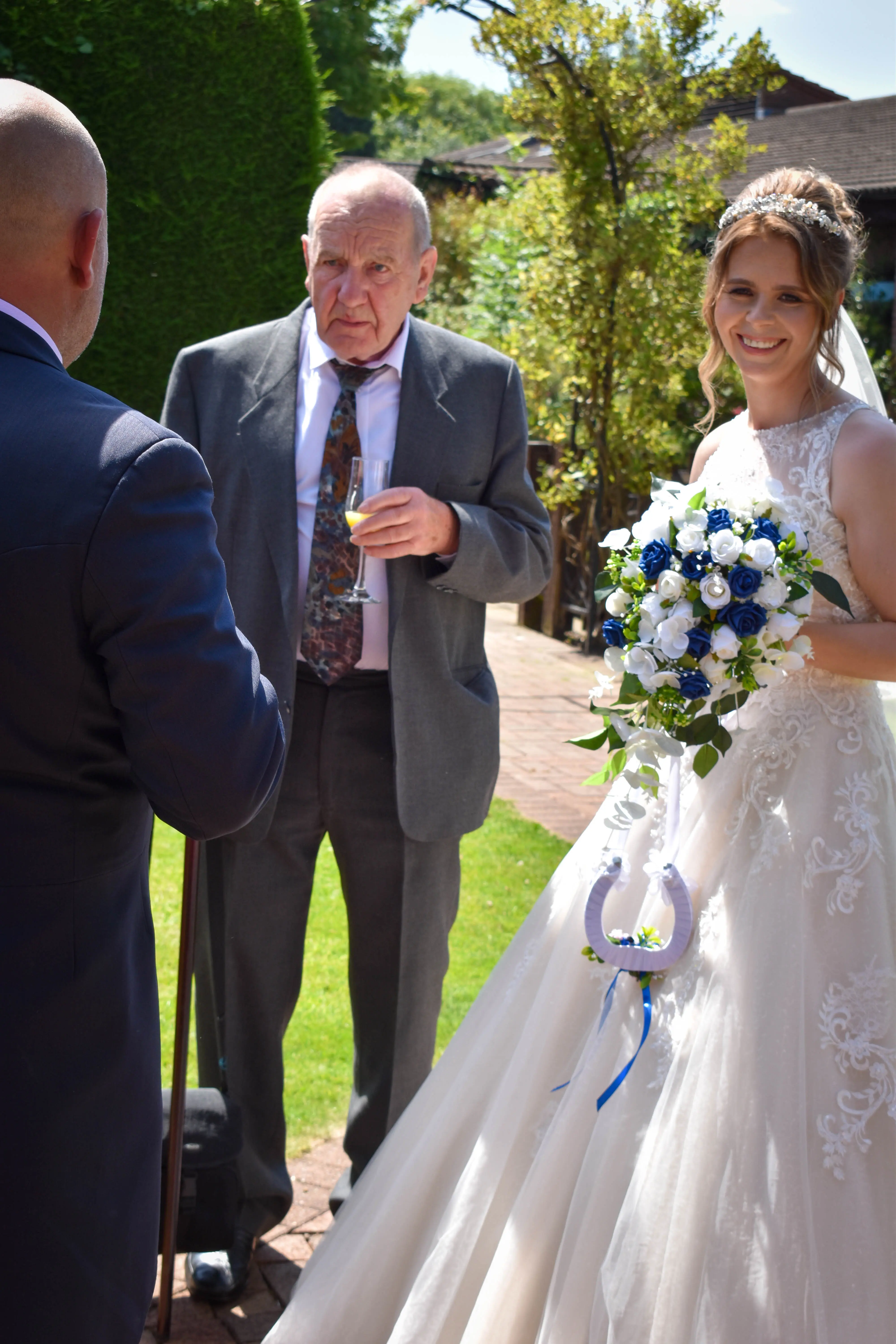 Bride wearing a lace and tulle ballgown wedding dress