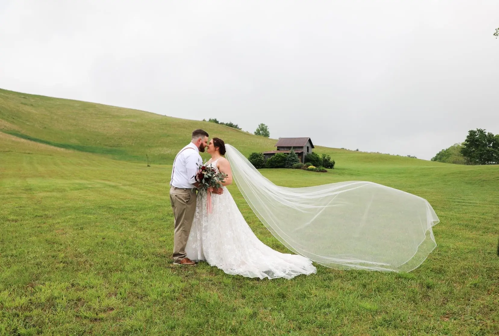 Groom With Bride Wearing Lace Ball Gown Lorenza By Maggie Sottero