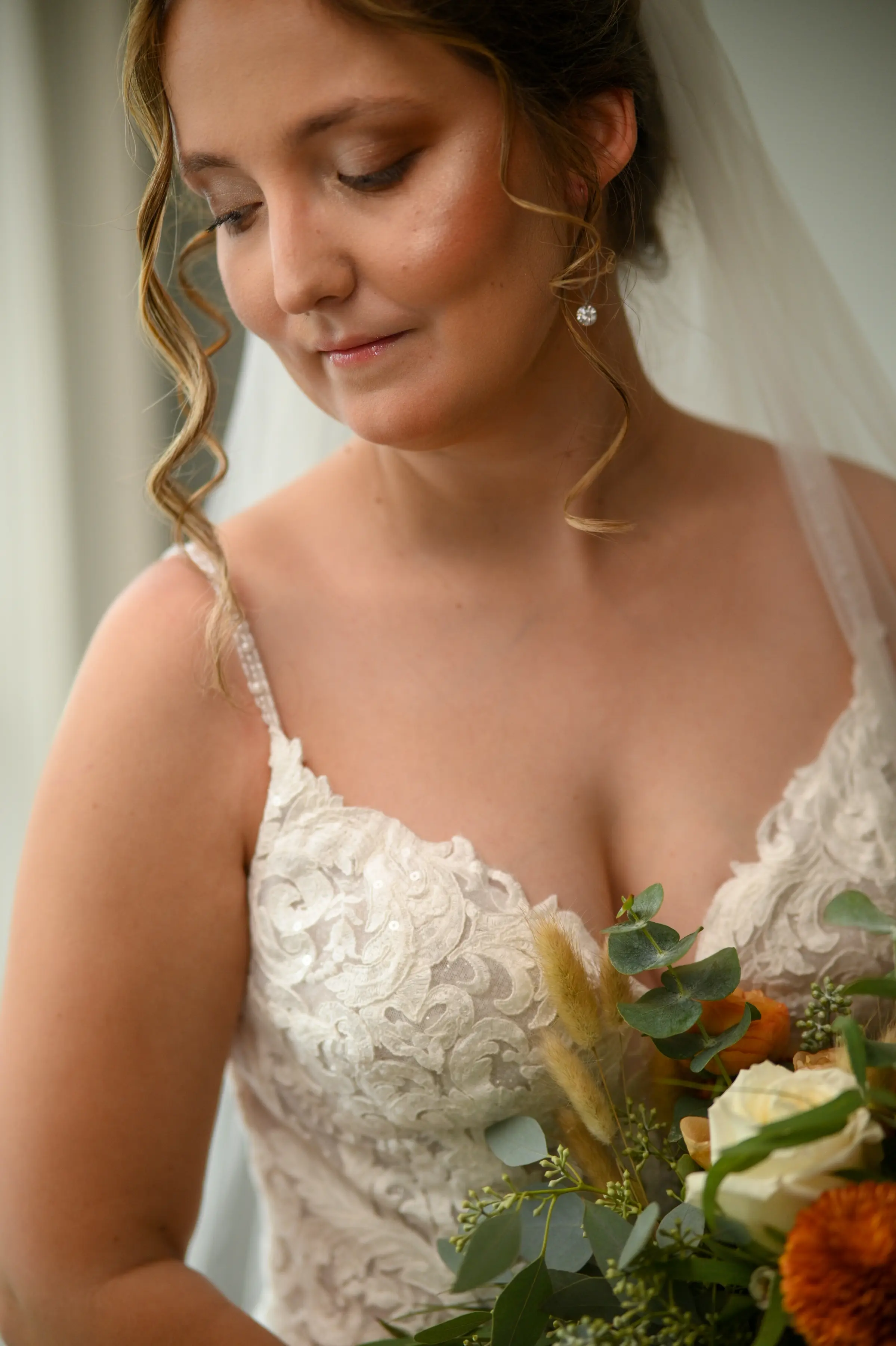 Bride wearing Florence wedding dress by Maggie Sottero