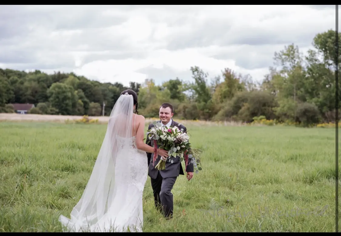 Groom With Bride Wearing Lace Sheath Wedding Dress Tuscany Lynette By Maggie Sottero