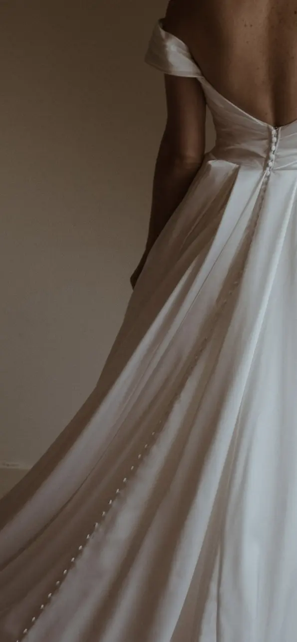 Bride wearing Scarlet wedding dress by Maggie Sottero