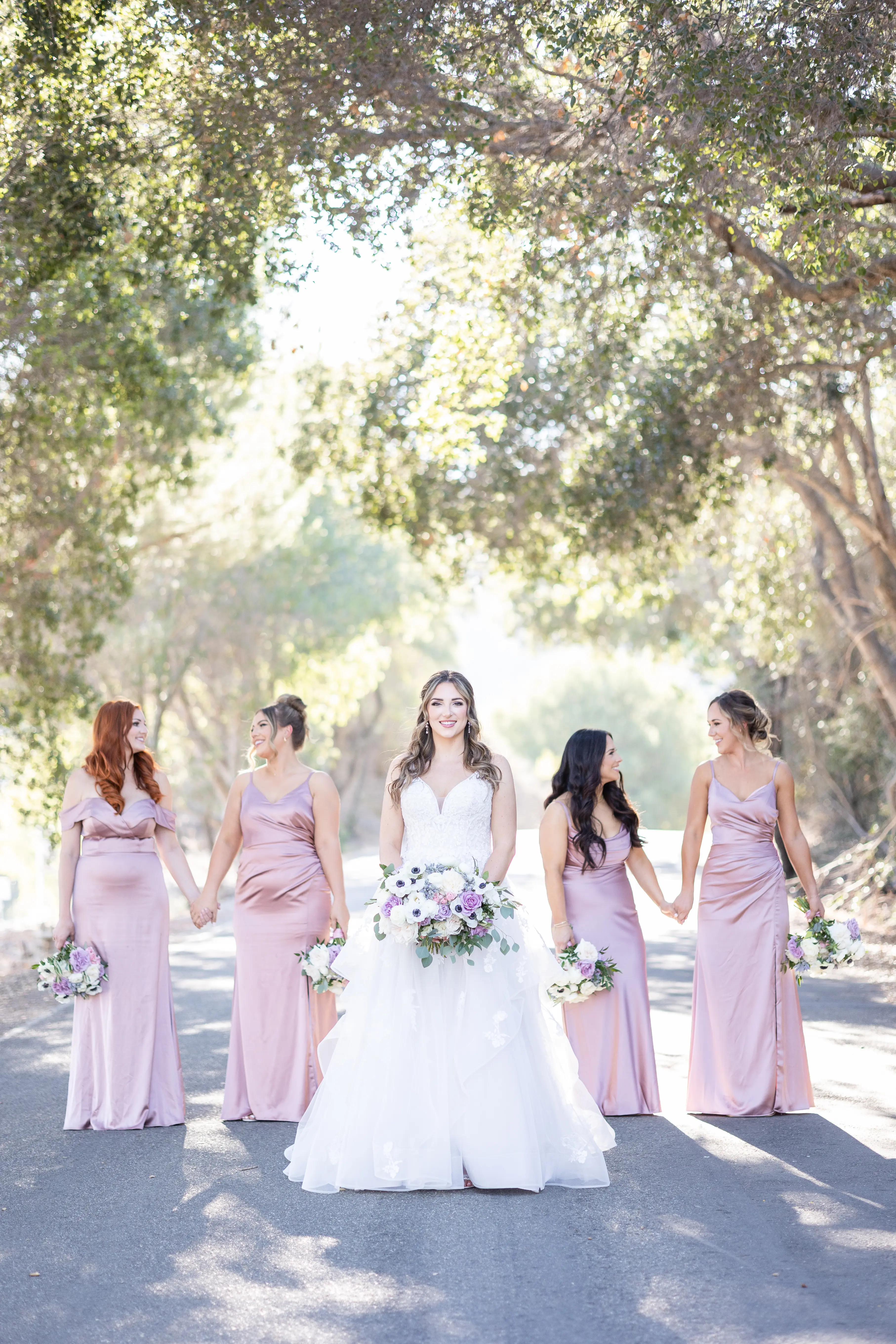 Bride Wearing Lace Wedding Dress With Tiered Tulle Skirt Lettie By Rebecca Ingram
