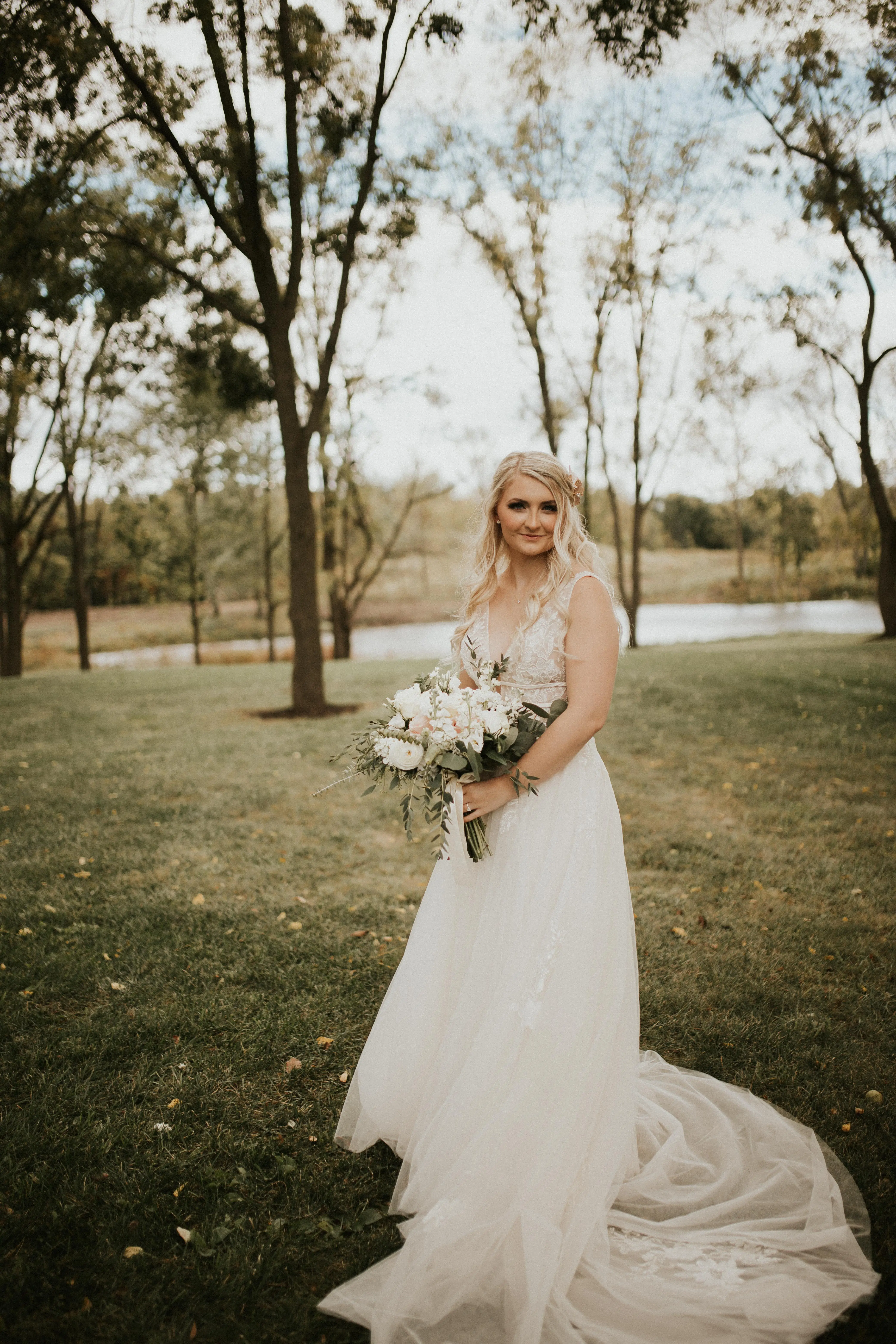 Bride Wearing Wedding Dress Called Raelynn by Rebecca Ingram