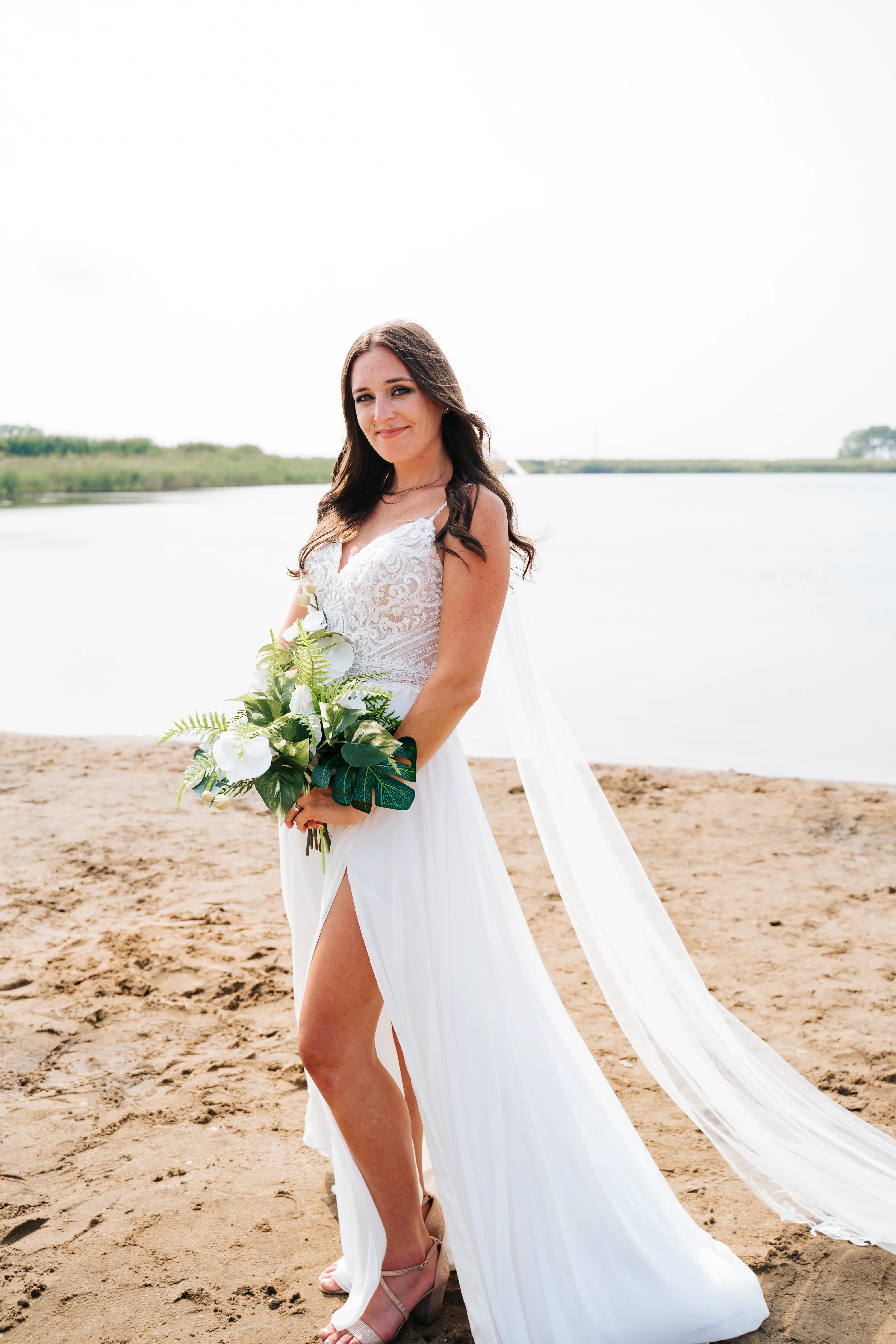 Bride Wearing Beach Wedding Dress Called Lorraine By Rebecca Ingram On The Beach