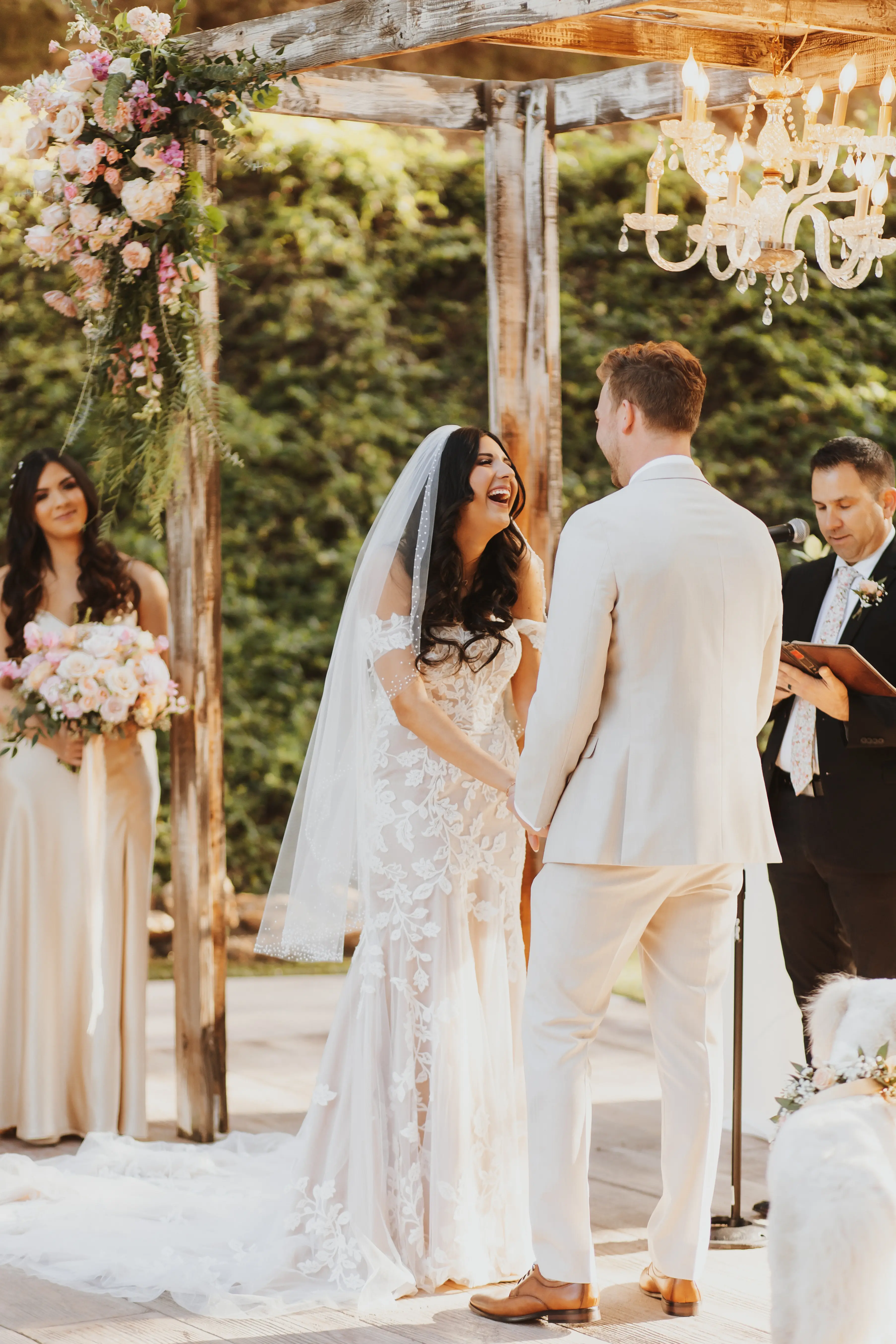 Bride In Romantic Mermaid Wedding Dress Called Ivy By Maggie Sottero With Groom In Grey At Outdoor Wedding Ceremony