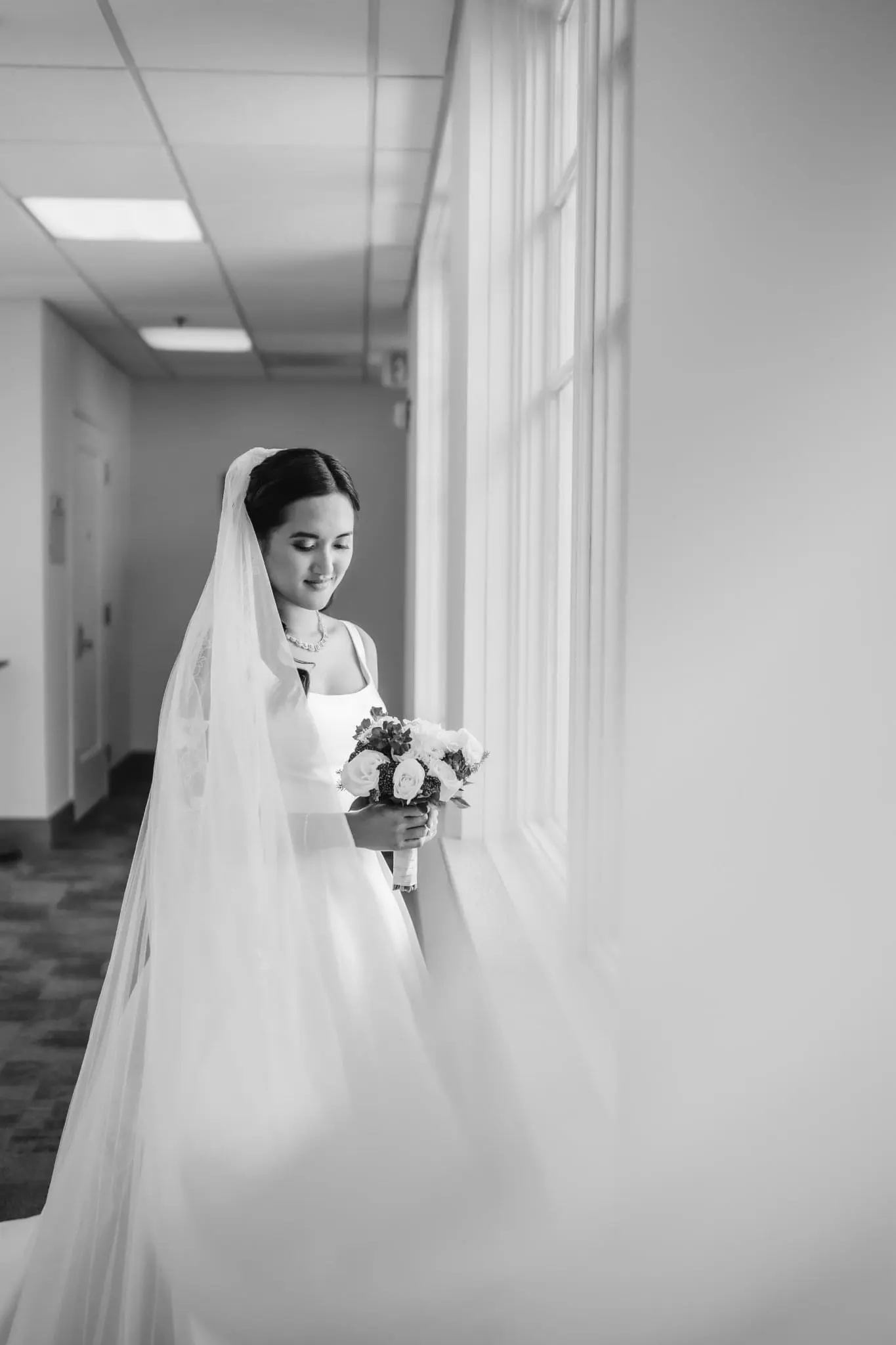 Bride Posing With Bouquet Wearing Satin Wedding Dress Ball Gown Called Selena By Maggie Sottero
