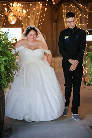 Bride wearing Anniston by Maggie Sottero with her husband