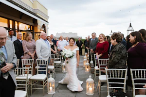 Bride wearing elegant off the shoulder wedding dress