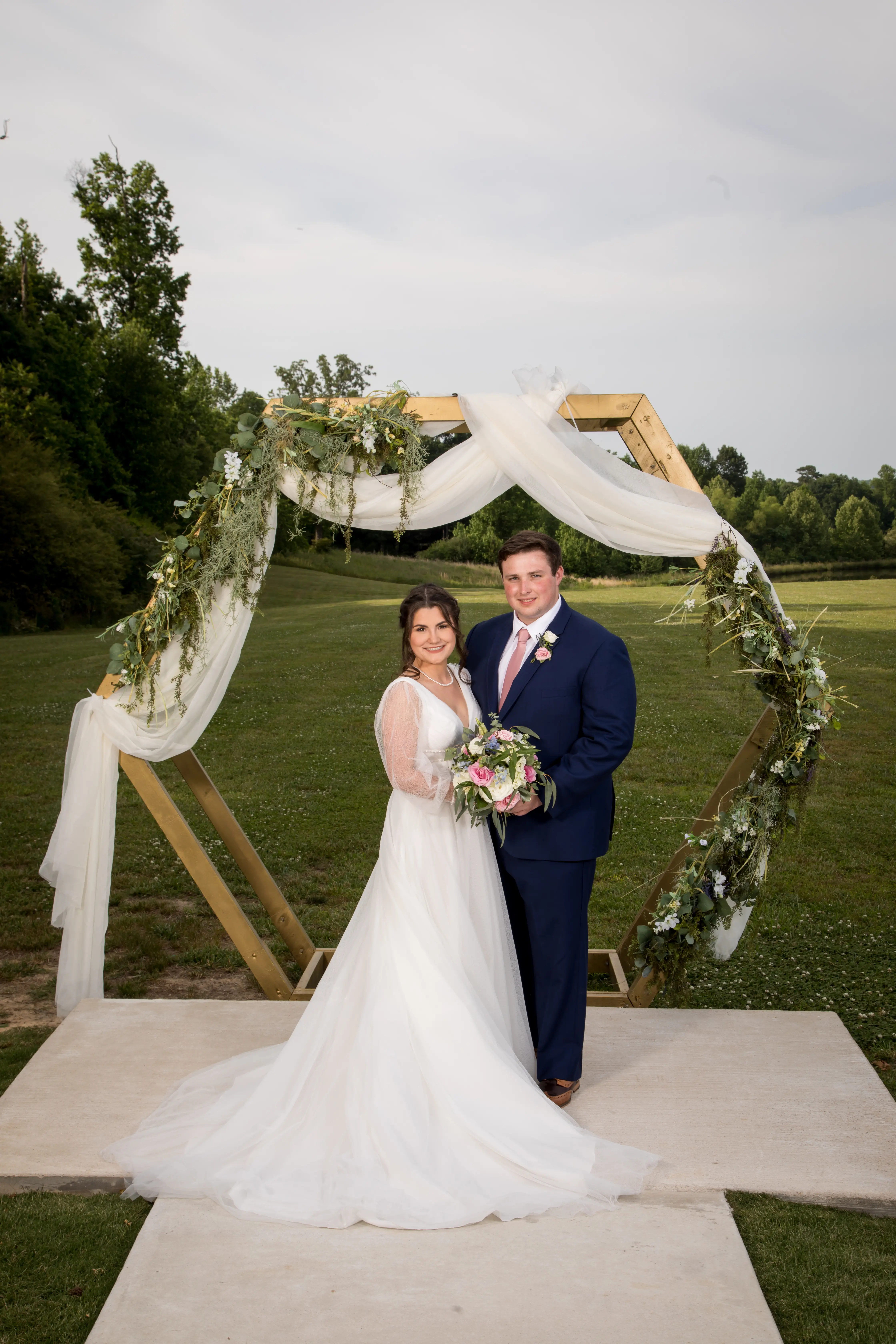 Groom With Bride Wearing A-Line Vintage Wedding Dress Joanne By Rebecca Ingram
