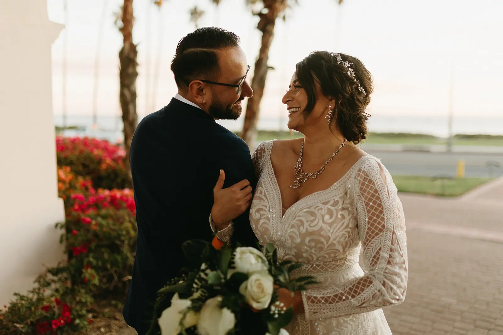 Bride Wearing Lace A-Line Wedding Dress Called Roxanne By Sottero And Midgley With Groom