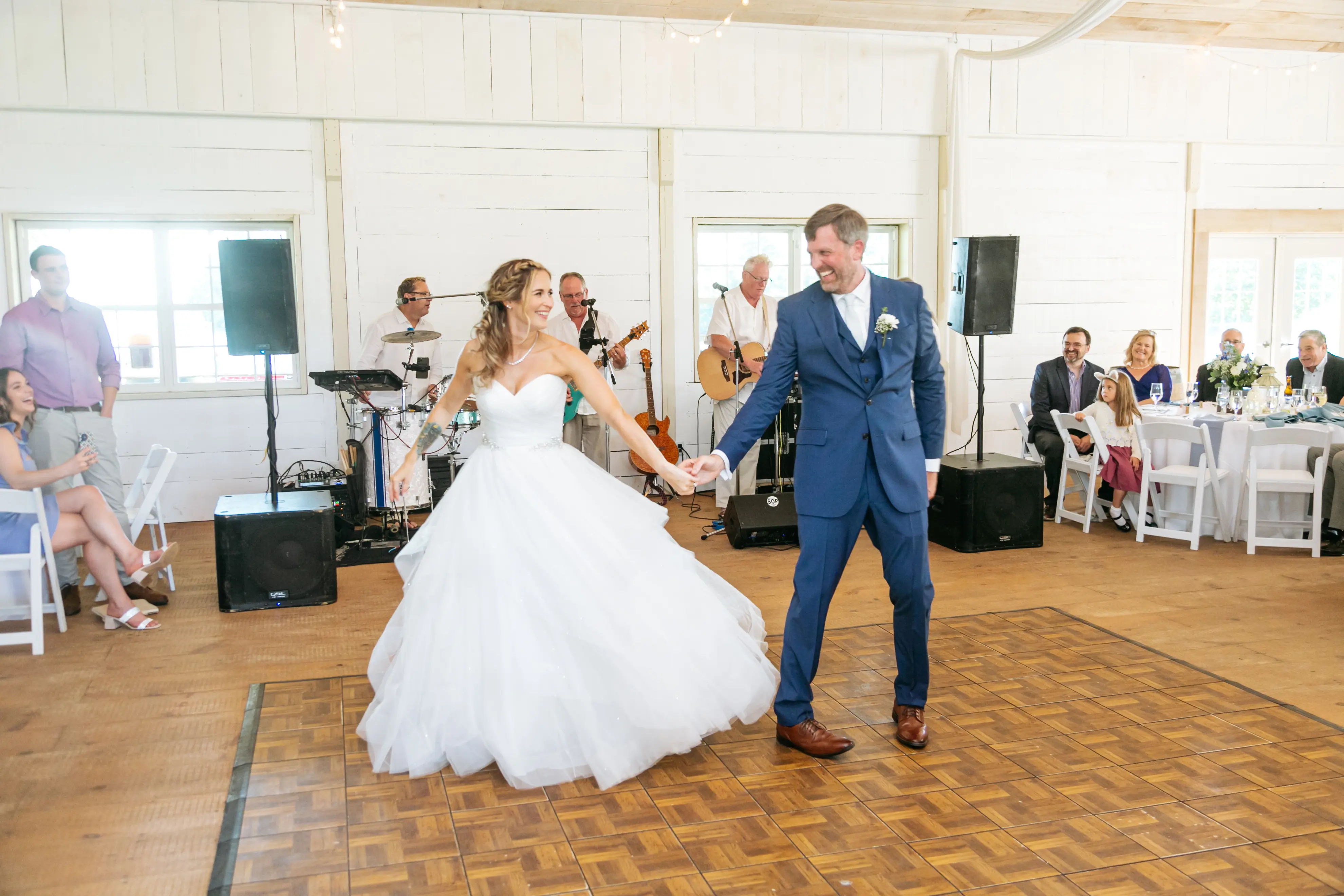 Bride Dancing in Strapless Sweetheart Neckline Ball Gown Wedding Dress Called Yasmin by Maggie Sottero