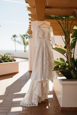 Boho Lace Wedding Dress Called Roxanne By Sottero And Midgley Hanging In The Rafters