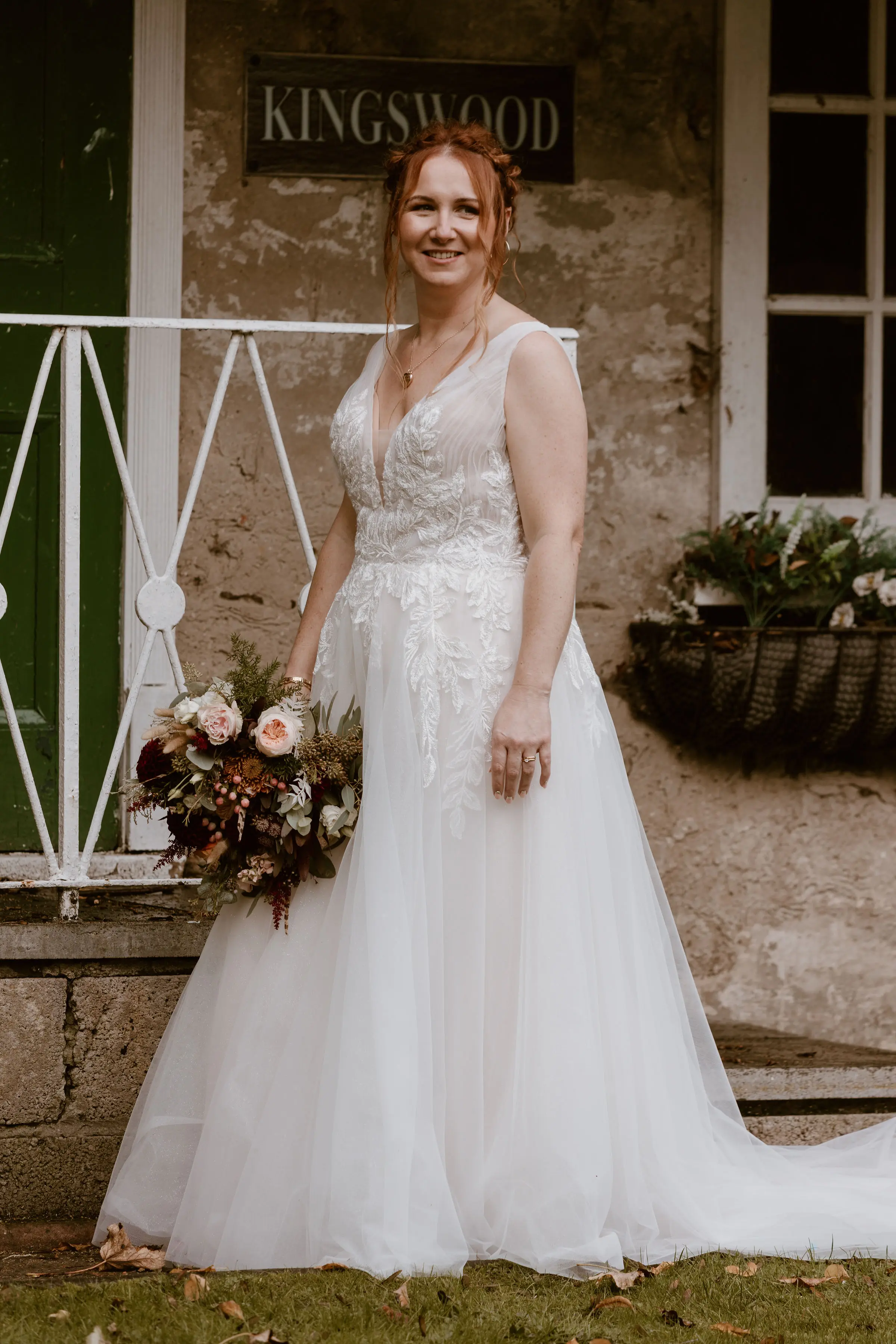 Real Bride in Nature-Inspired Tulle Wedding Dress with Plunging V-Neckline Called Jenessa by Rebecca Ingram