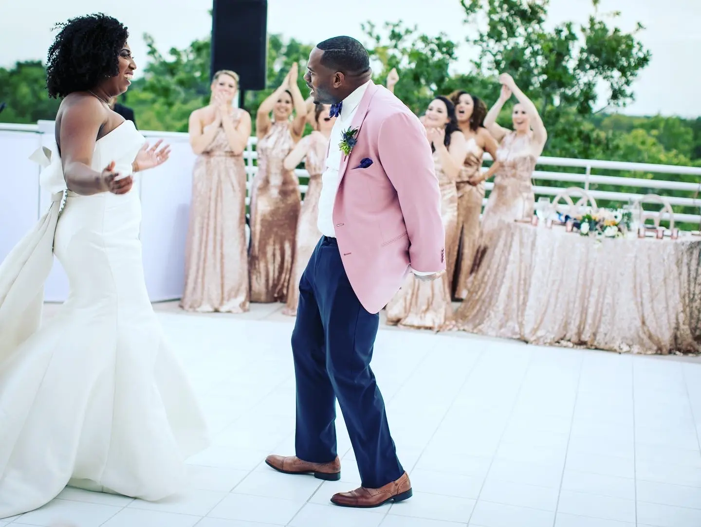 Groom Dancing With Bride In Strapless Sleek Wedding Dress Named Mitchell By Maggie Sottero