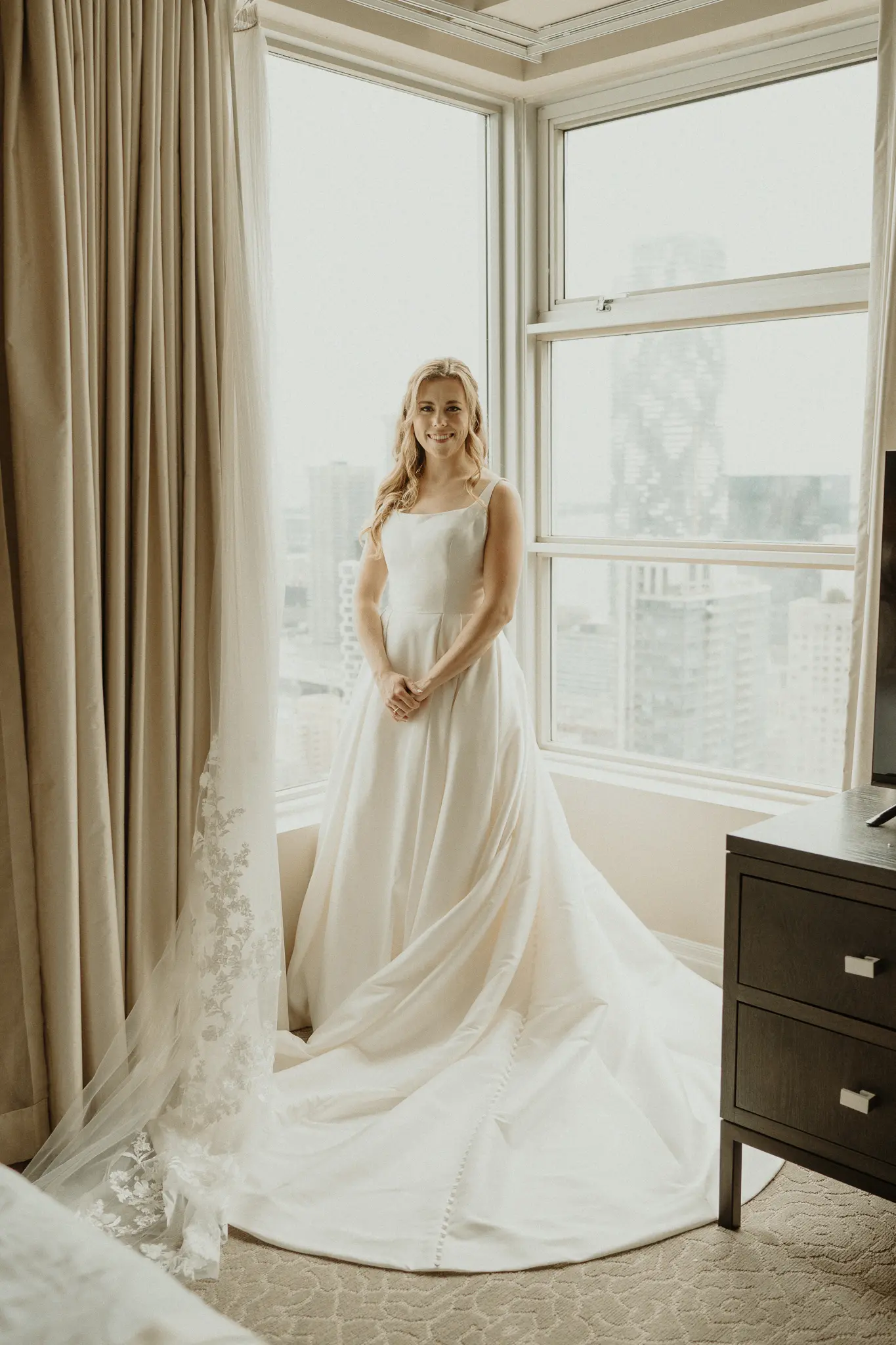 Bride wearing Selena wedding gown by Maggie Sottero