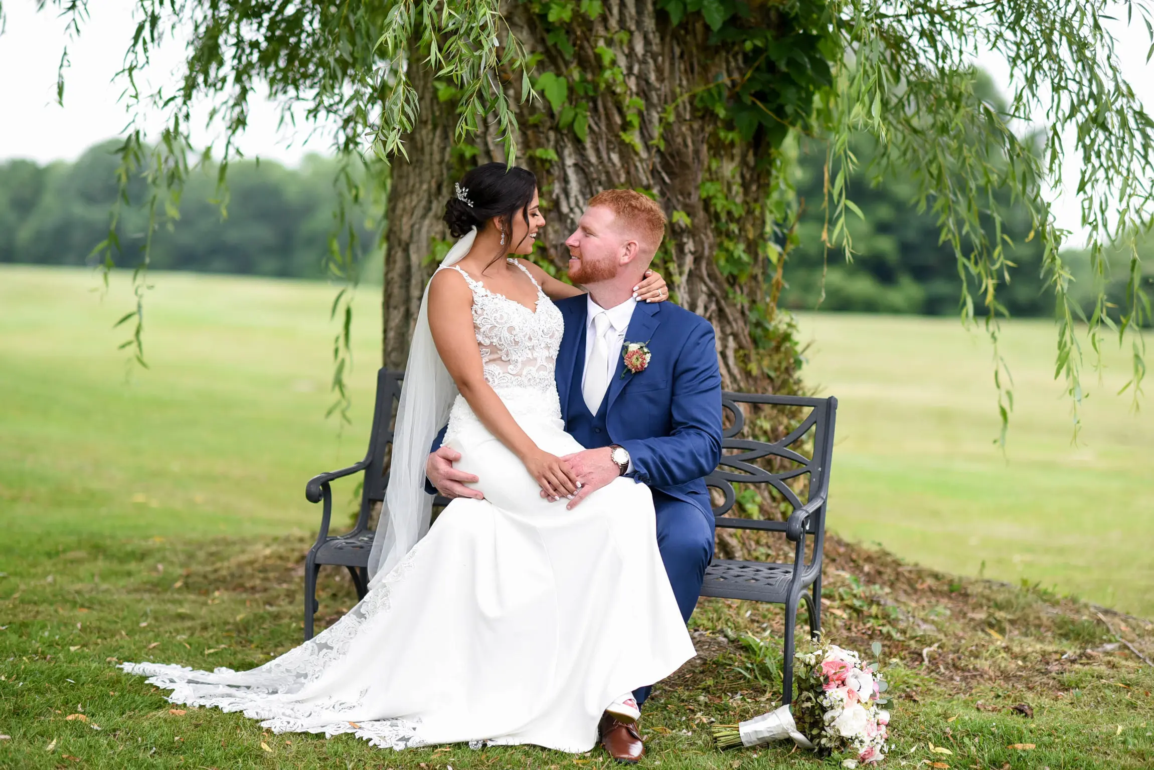 Bride with groom wearing crepe sheath wedding dress