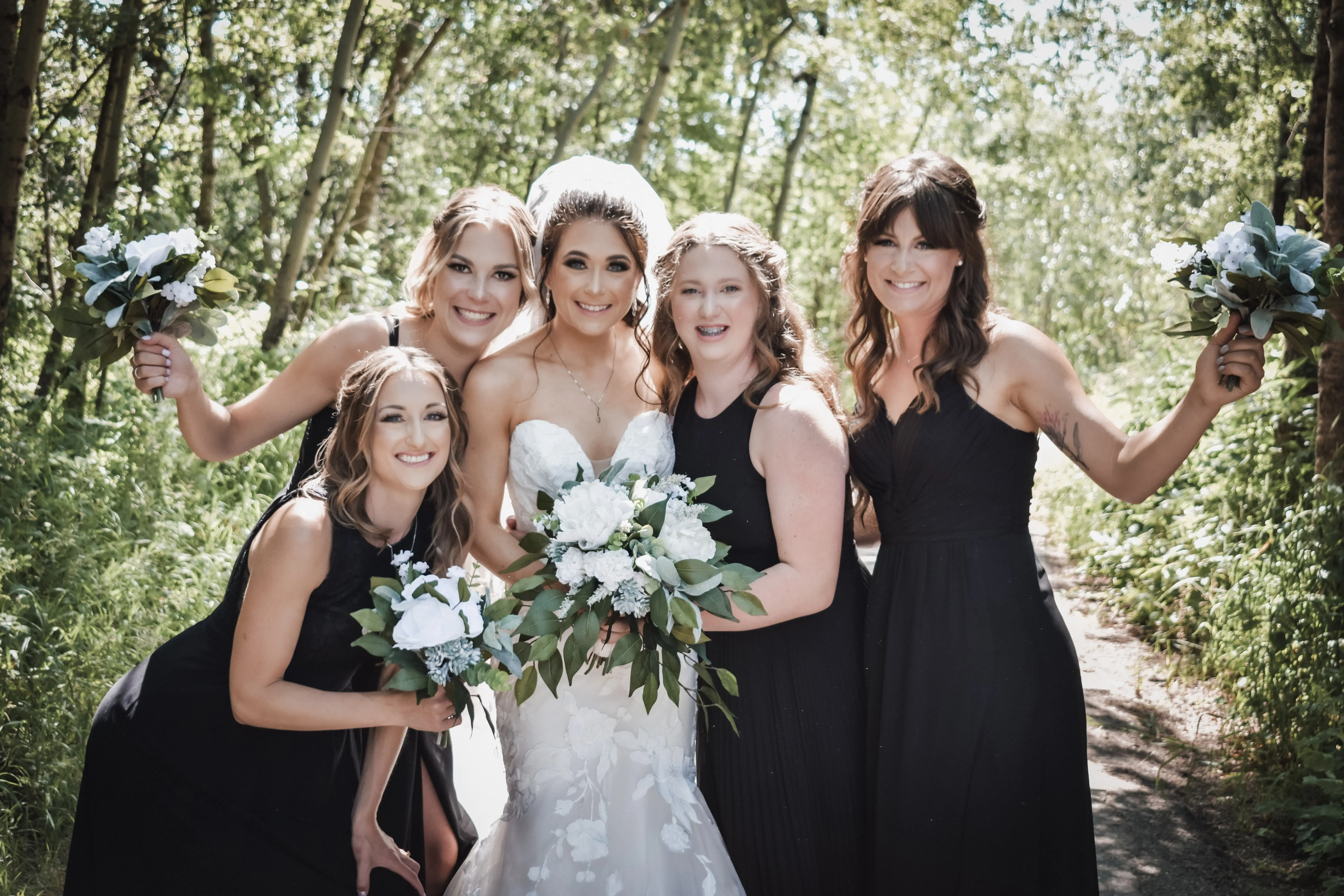 Bride Wearing Lace Mermaid Wedding Dress Called Hattie By Rebecca Ingram With Bridesmaids