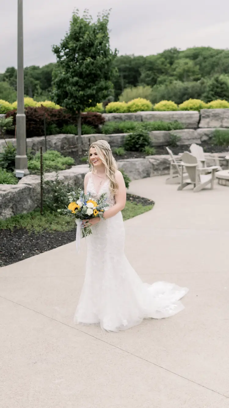 Bride in Floral Fit-and-Flare Wedding Dress Decked Out in Garden-Inspired Lace called Greenley by Maggie Sottero