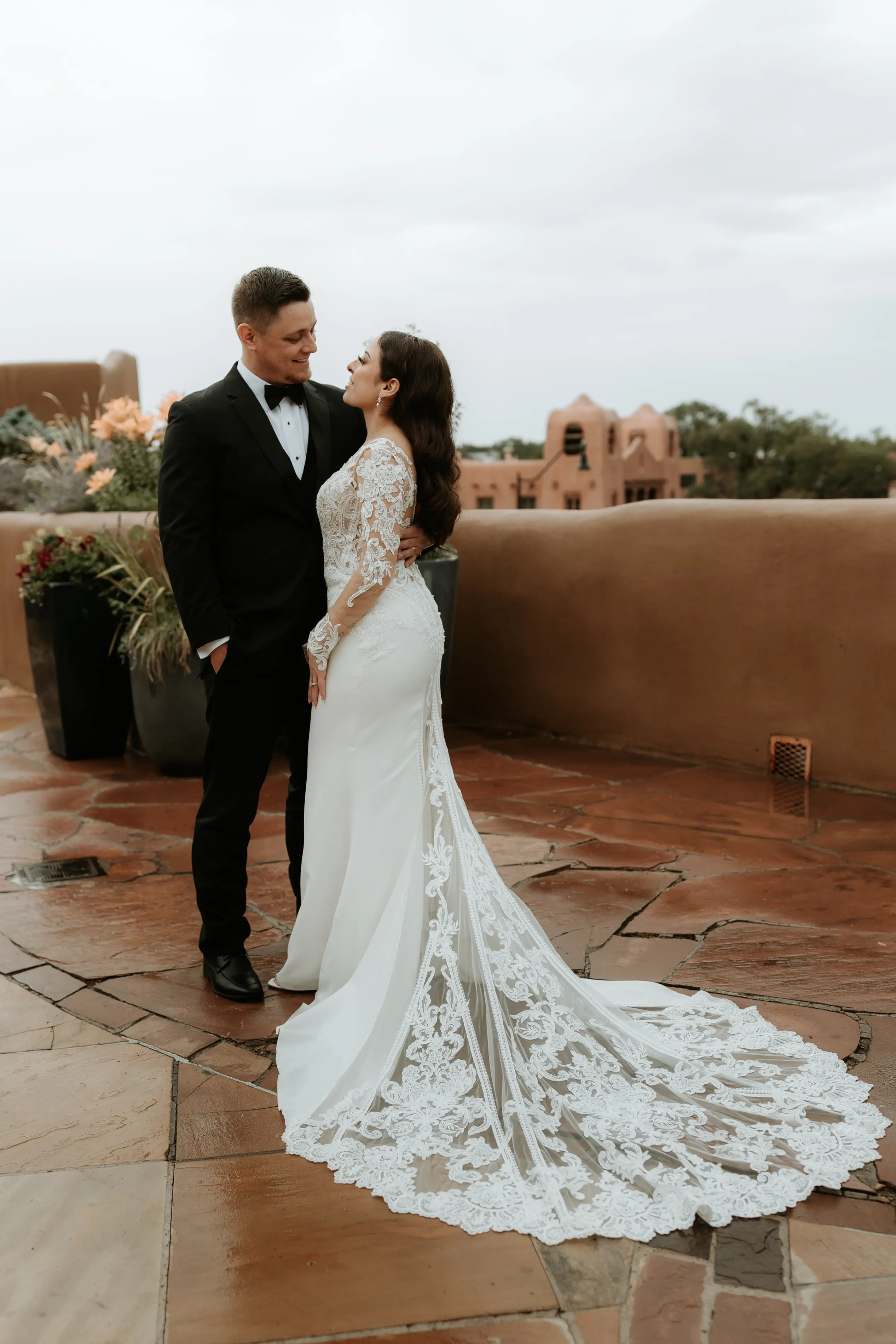 Groom With Bride Wearing Elegant Sleeved Wedding Dress Cambridge Dawn By Sottero And Midgley
