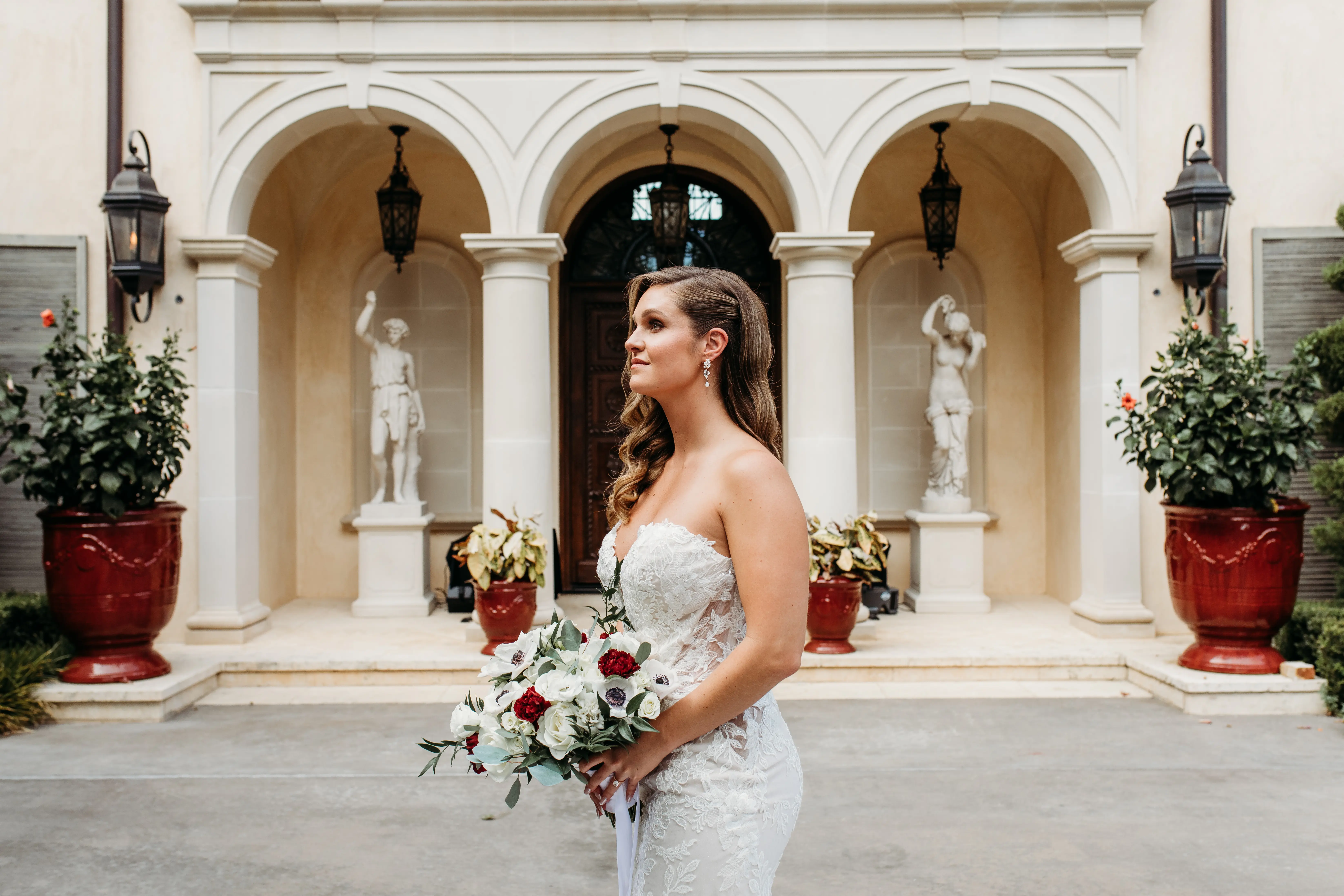 Bride Wearing Lace Mermaid Wedding Gown Called Montgomery By Sottero and Midgley Looking Off To The Distance