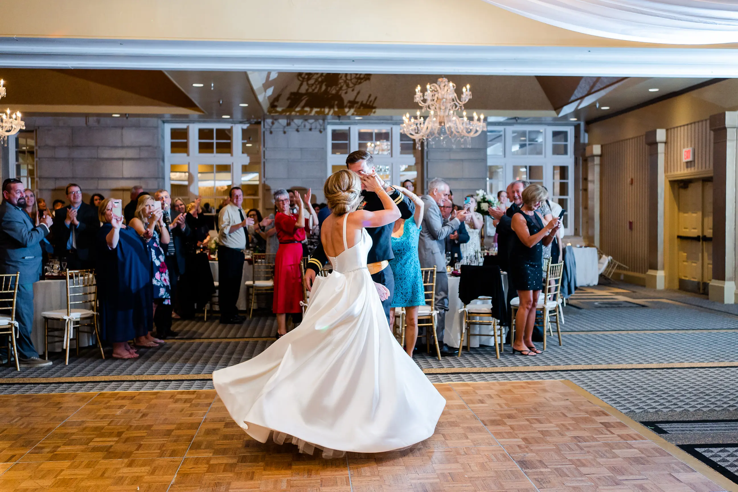 Bride wearing Simple Ballgown Wedding Dress called Selena by Maggie Sottero dancing with the groom