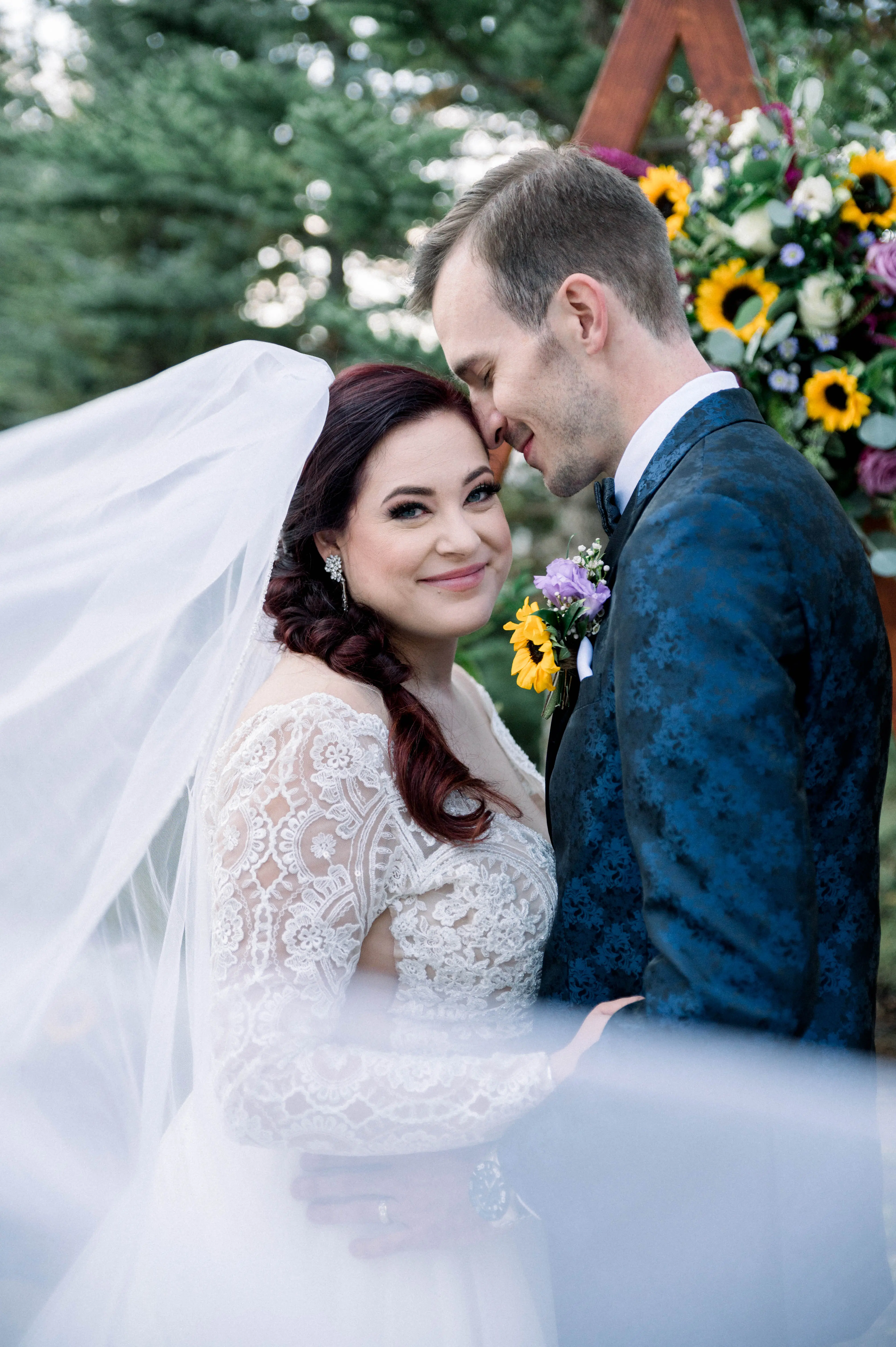Bride Wearing Princess Wedding Dress Called Mallory Dawn By Maggie Sottero with Groom in the Forest
