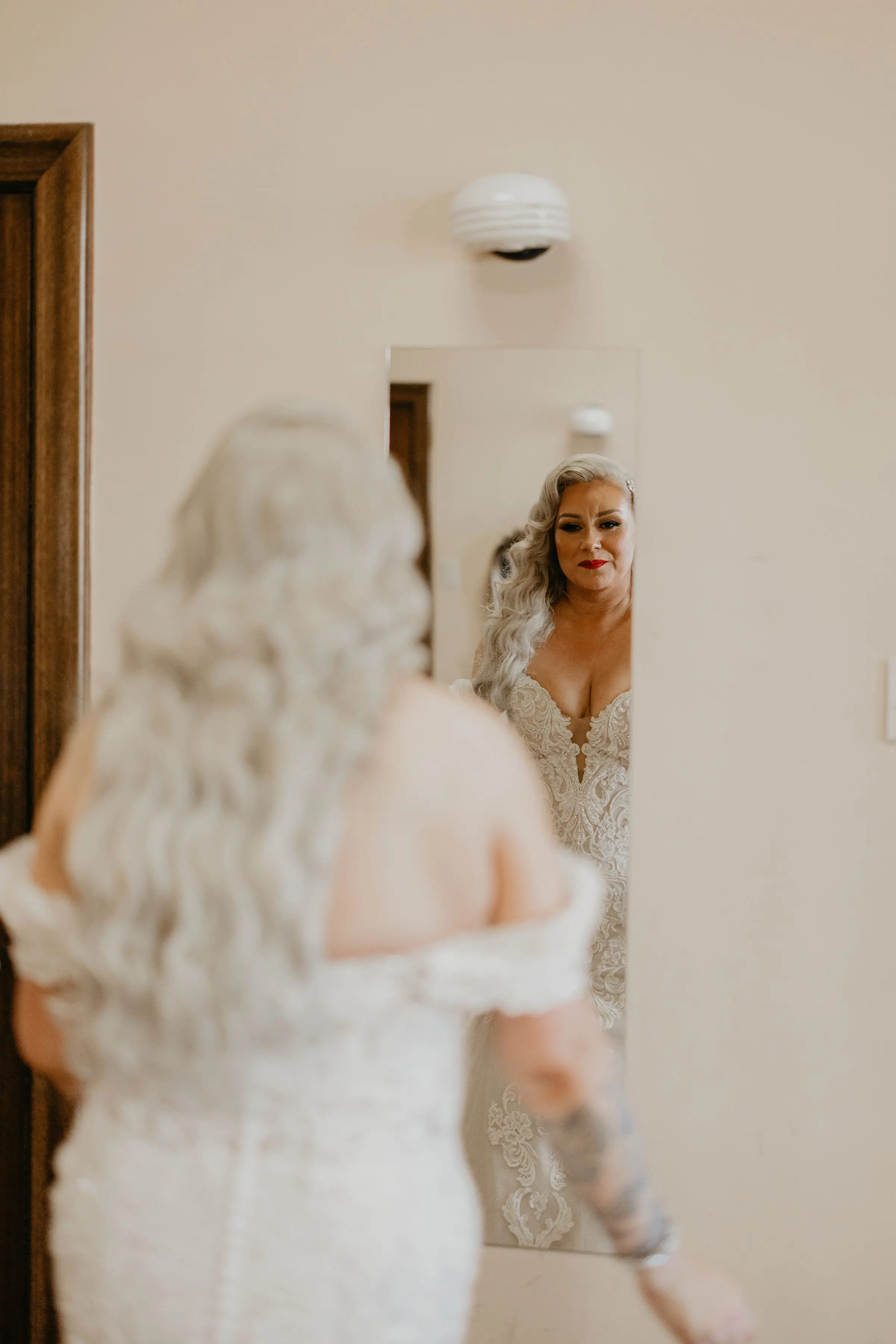 Bride Wearing Sexy Lace Wedding Dress Called Fiona By Maggie Sottero Looking In A Mirror