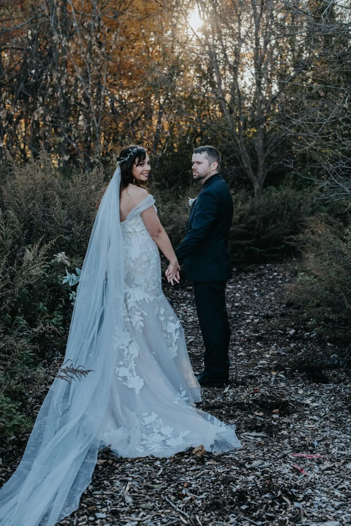 Groom with Bride in Strapless Mermaid Bridal Gown with Sweetheart Neckline Called Hattie by Rebecca Ingram