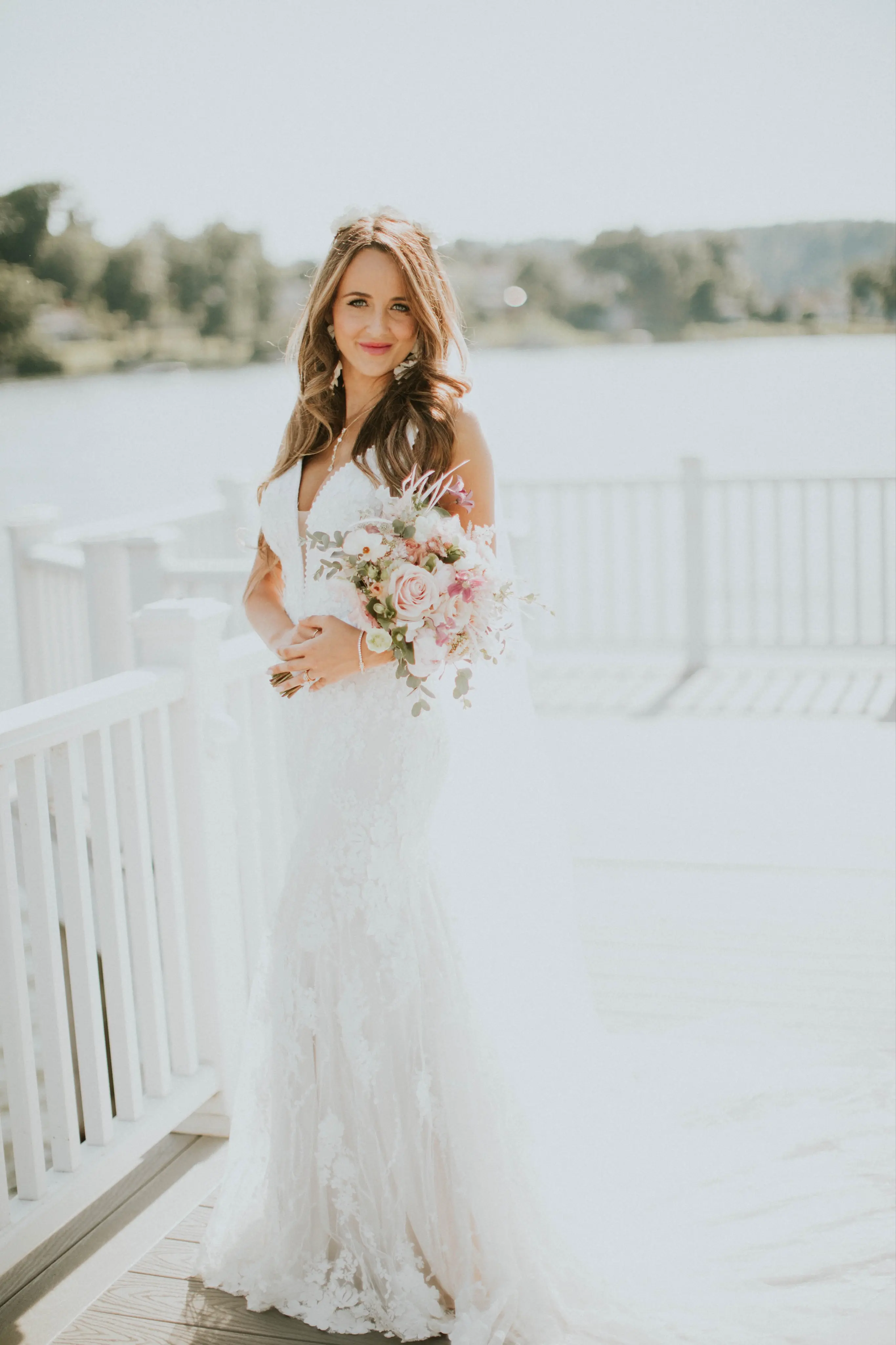 Bride in Mermaid Wedding Dress with 3-D Floral Motifs Called Cruz by Sottero & Midgley