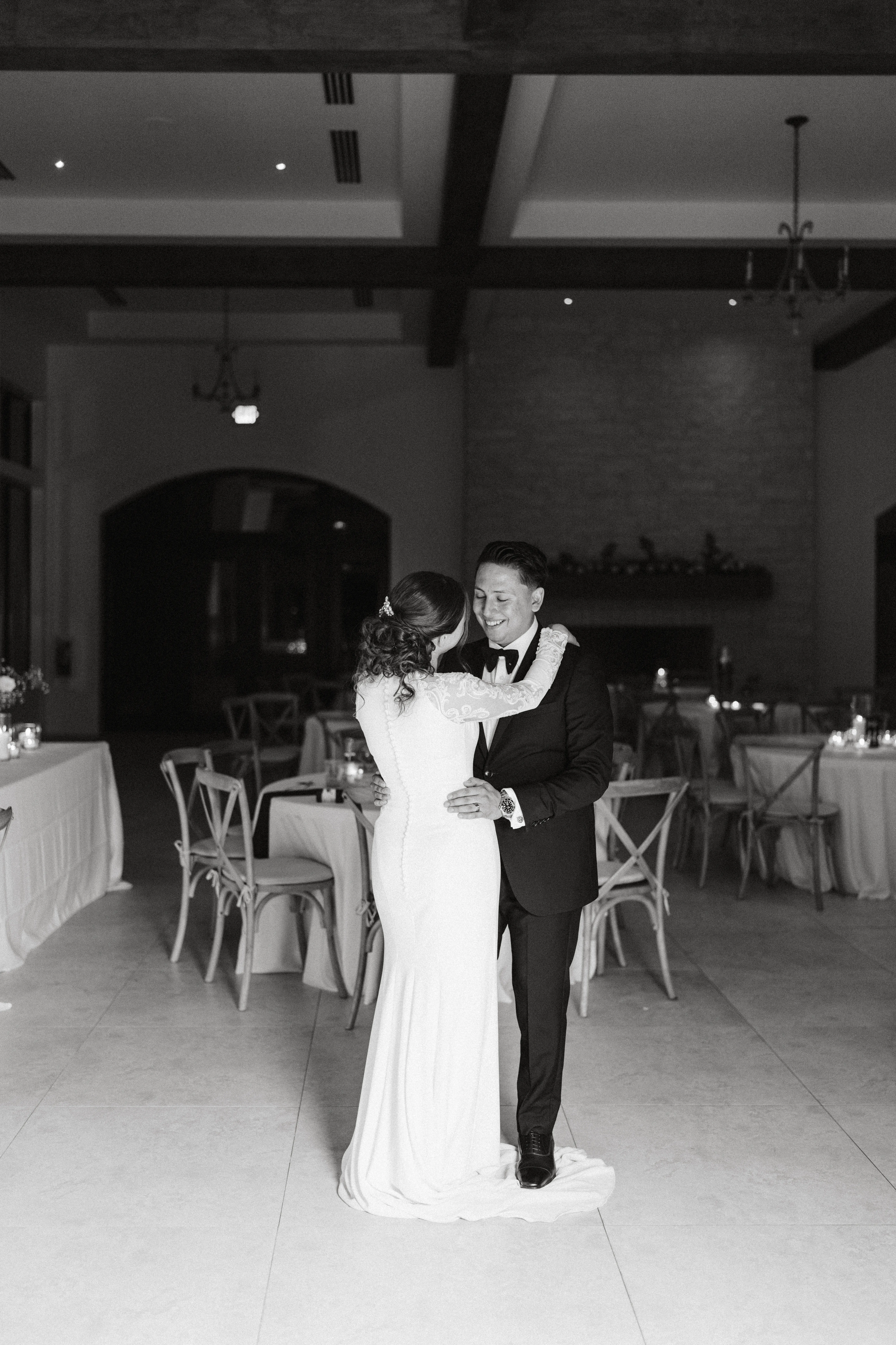Bride Wearing Simple Long Sleeve Wedding Dress Called Bethany By Rebecca Ingram Dancing With Groom