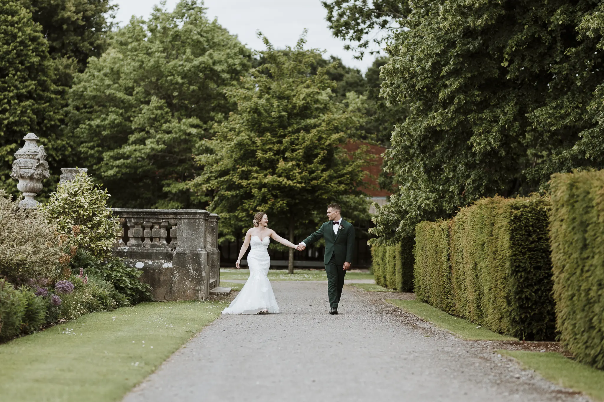 Groom With Bride Wearing Strapless Mermaid Wedding Dress With Oversized Lace Hattie By Rebecca Ingram