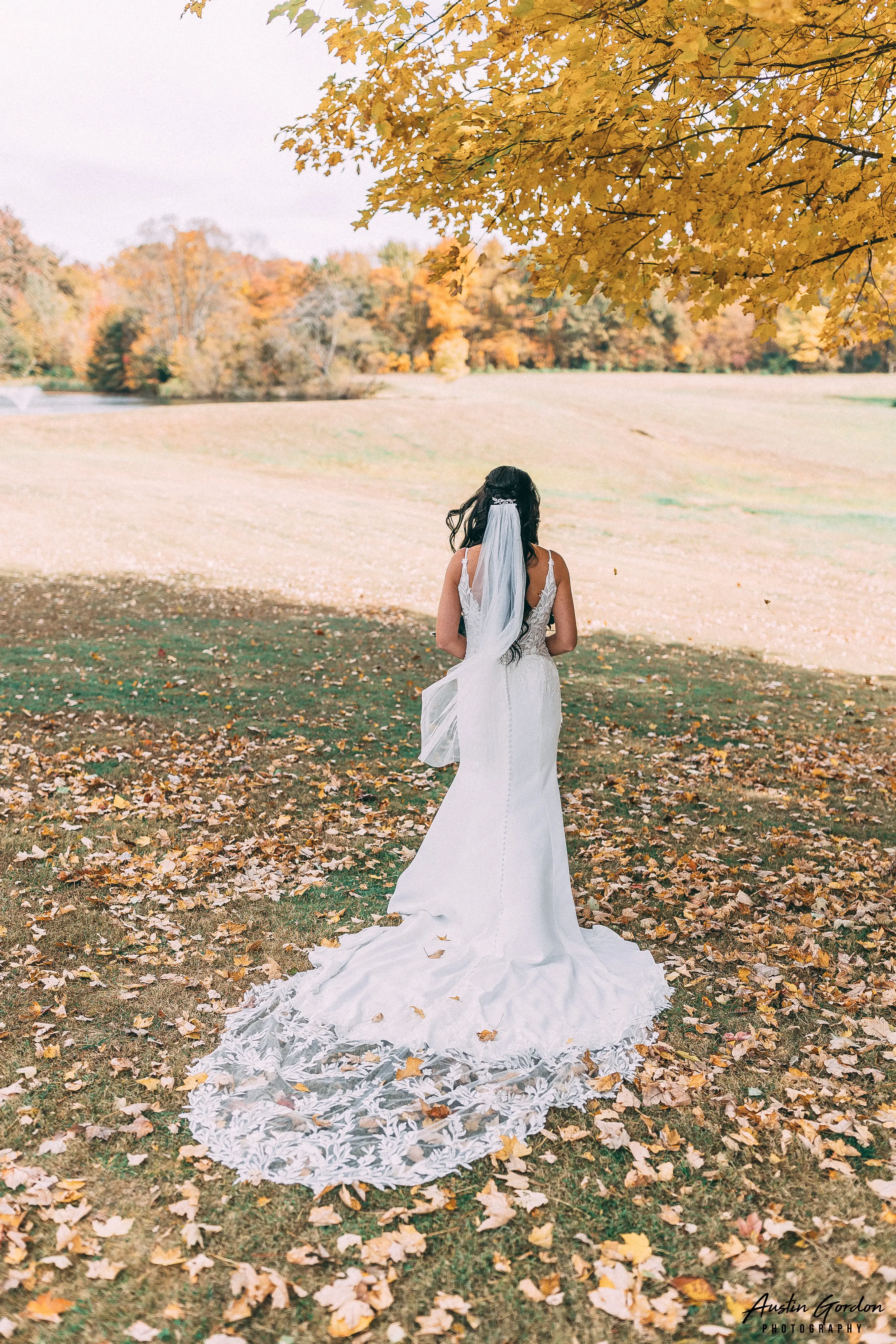 Bride Wearing Crepe Sheath Wedding Dress Called Alda By Rebecca Ingram