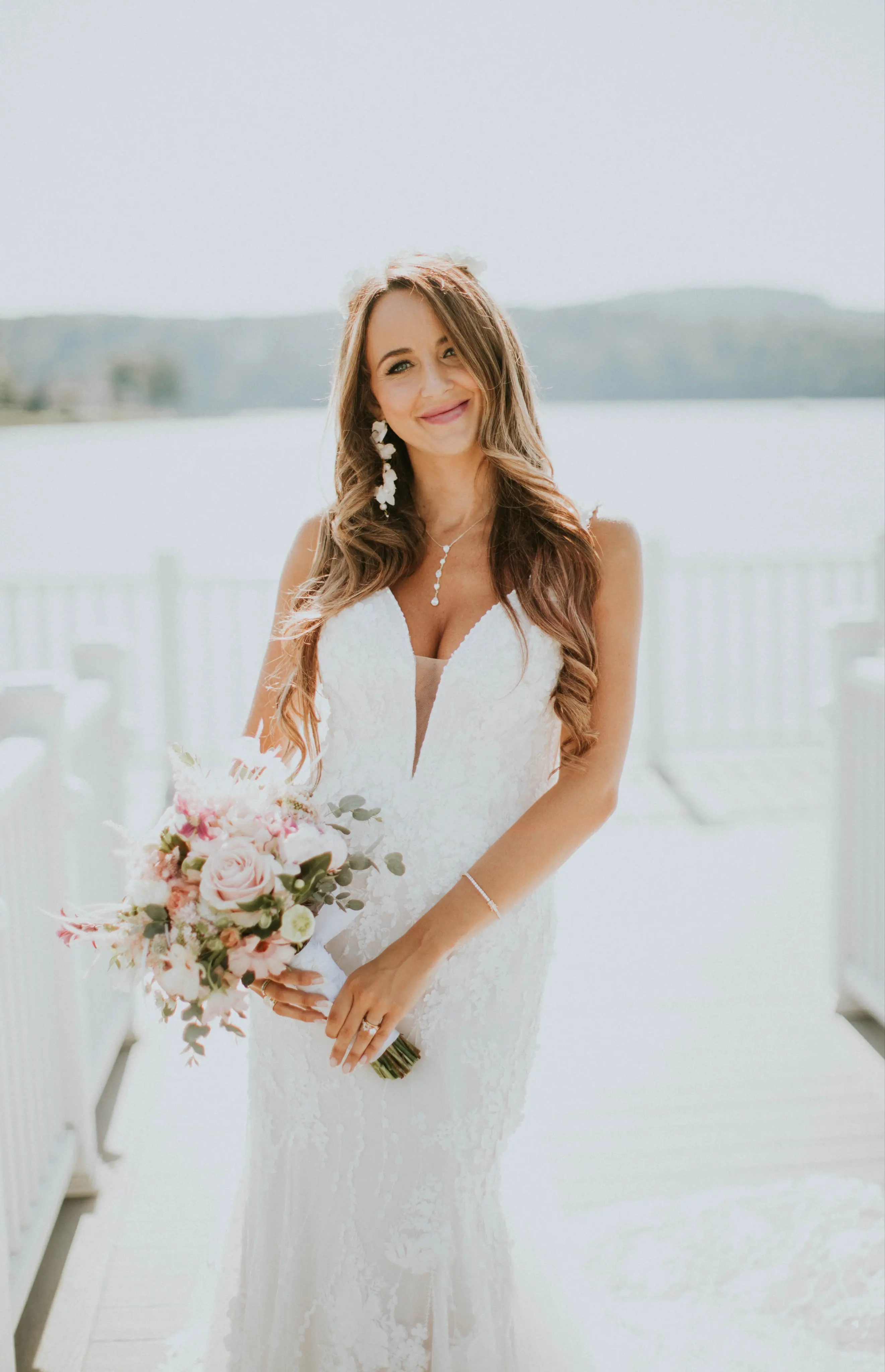 Bride in Mermaid Wedding Dress with 3-D Floral Motifs Called Cruz by Sottero & Midgley