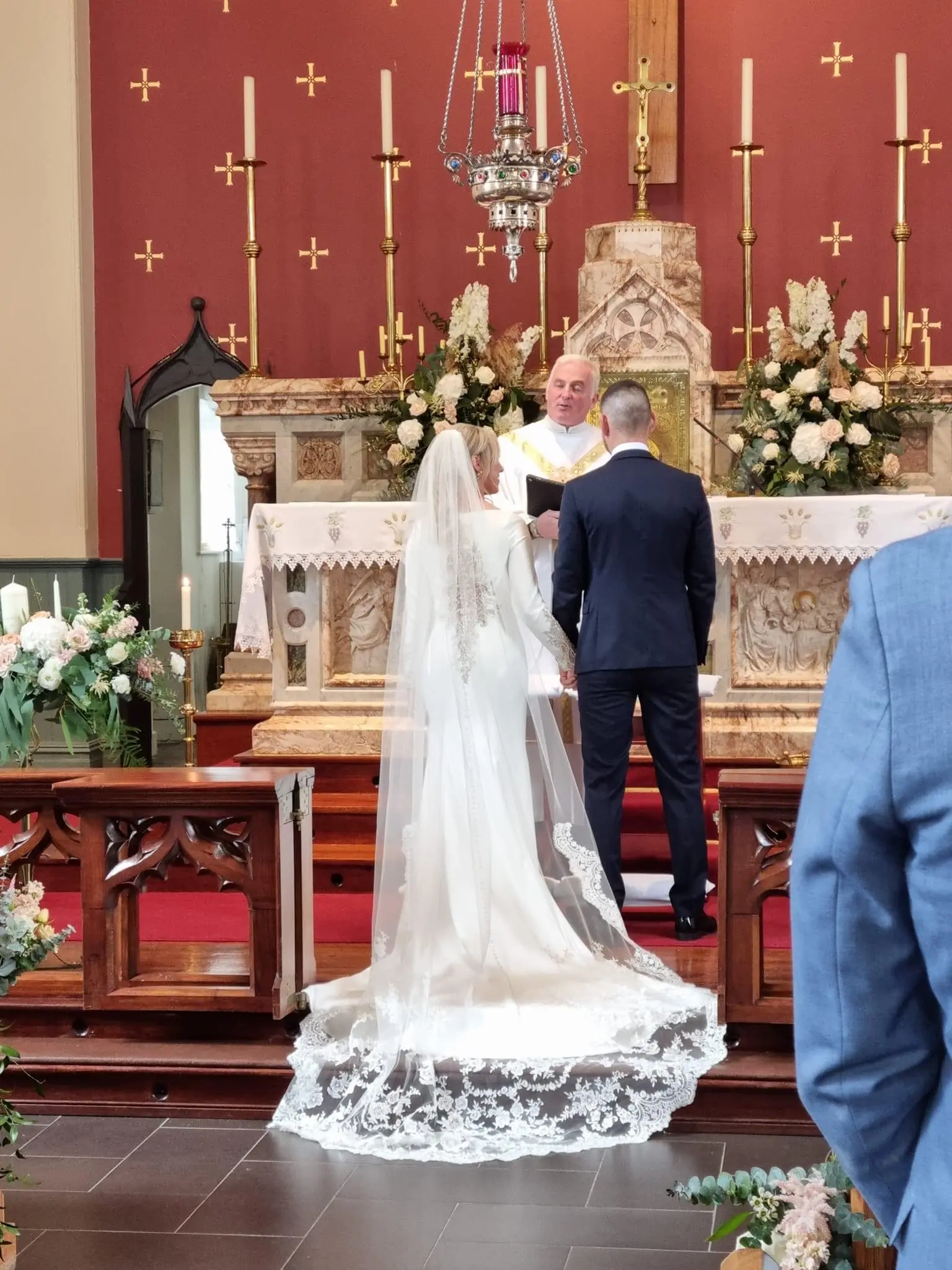 Bride Wearing Simple Crepe Wedding Dress Called Aston By Sottero And Midgley And Groom Getting Married