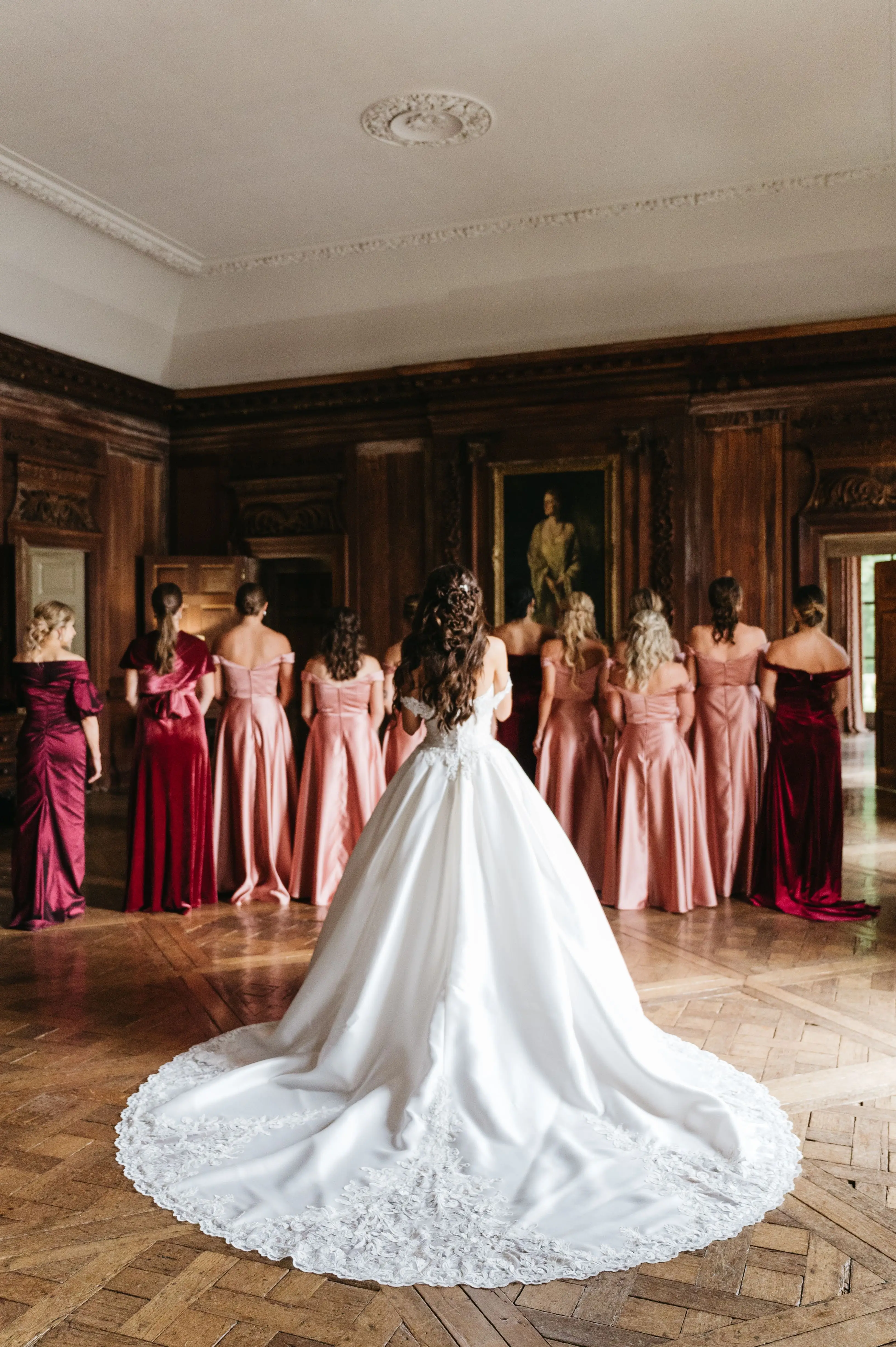 Bride In Satin Ballgown Wedding Dress Called Kimora By Sottero And Midgley With Bridesmaids In Reds And Pink