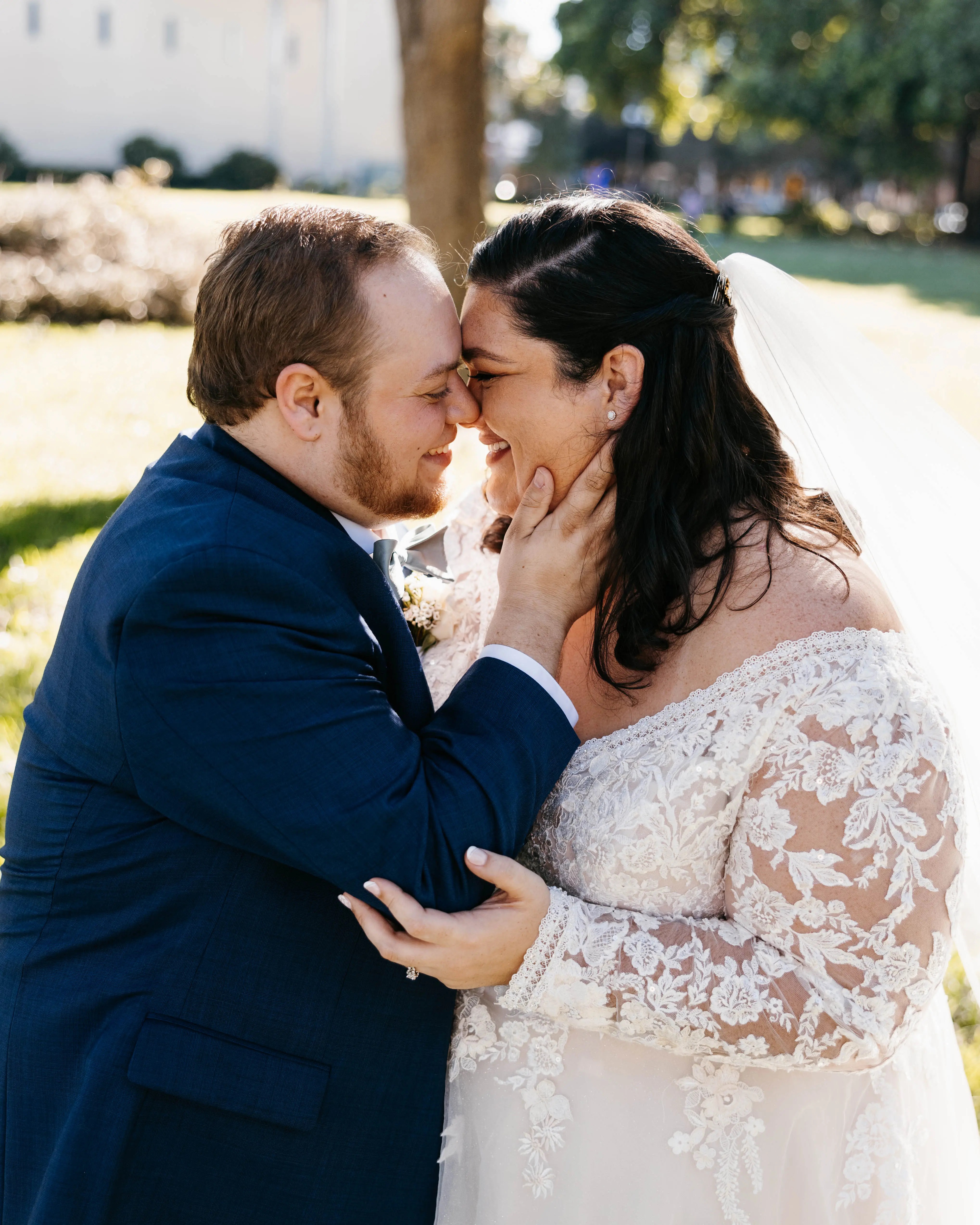 Groom With Bride Wearing Illusion Sleeve A-Line Wedding Dress Raphael By Maggie Sottero