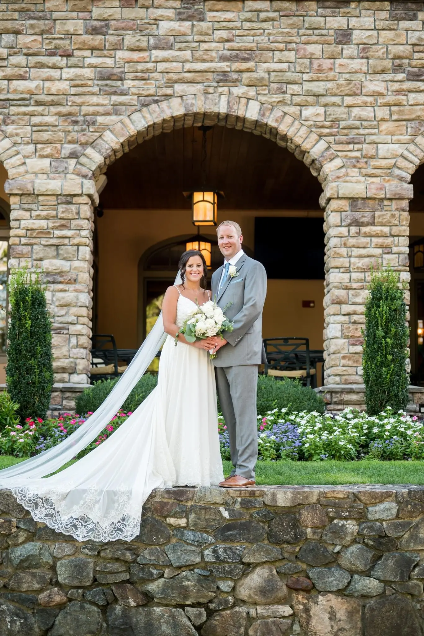 Groom With Bride Wearing Chiffon Wedding Dress With Flirty Lace Primrose By Maggie Sottero