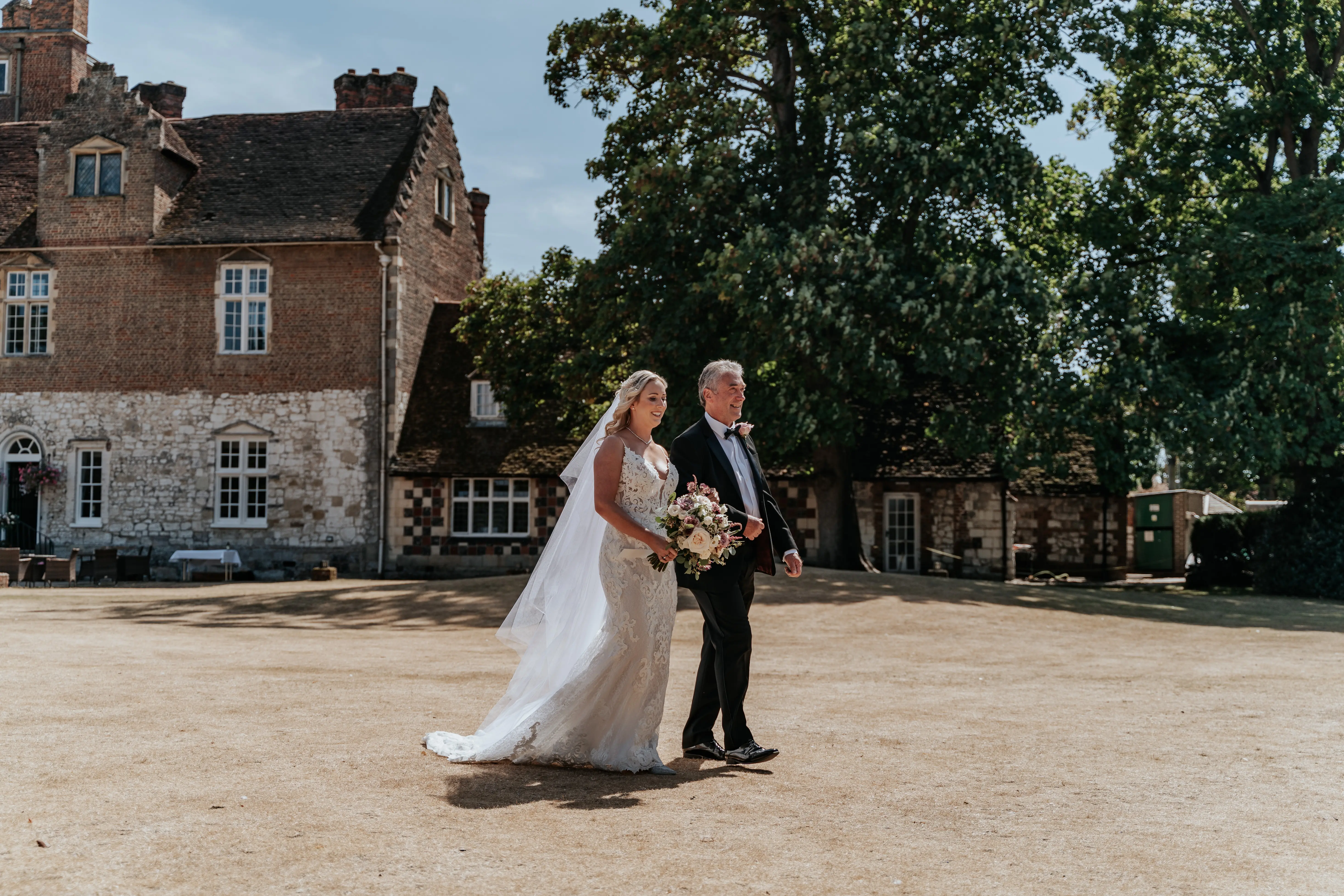 Real Bride in Lace Sheath Wedding Gown with Illusion Plunging Sweetheart Neckline Called Tuscany Lynette by Maggie Sottero