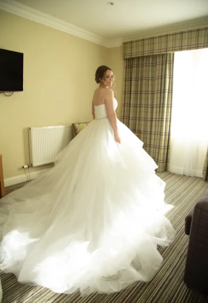 Bride Wearing Ball Gown With Tiered Skirt Yasmin By Maggie Sottero