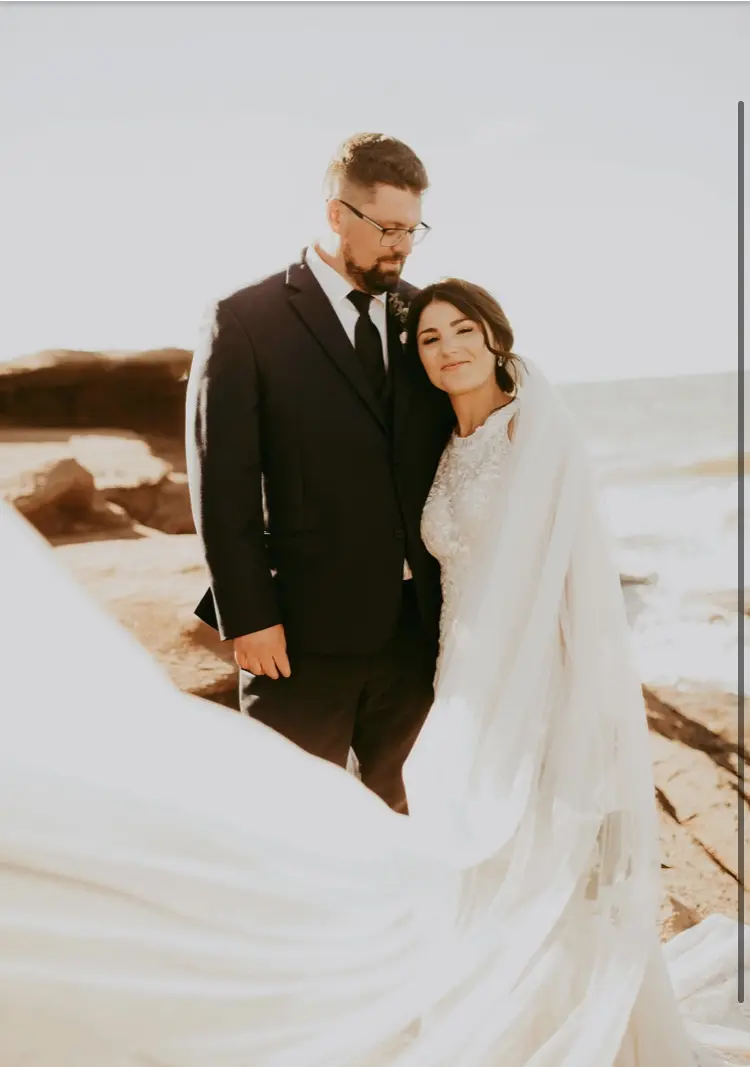 Groom With Bride Wearing Halter Fit-And-Flare Wedding Dress Kevyn By Sottero And Midgley