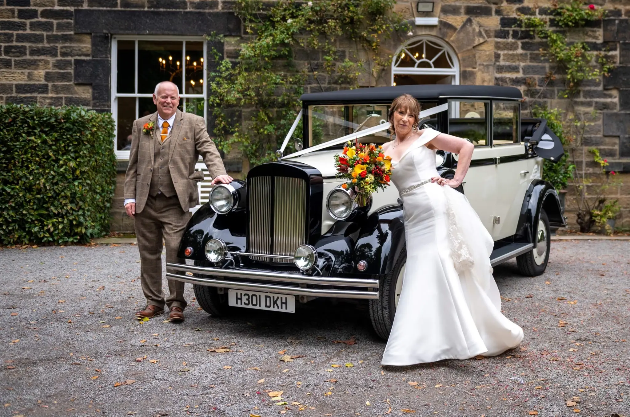 Real Bride in Off-the-Shoulder Fit-and-Flare Wedding Dress in Huron Mikado Called Josie by Rebecca Ingram