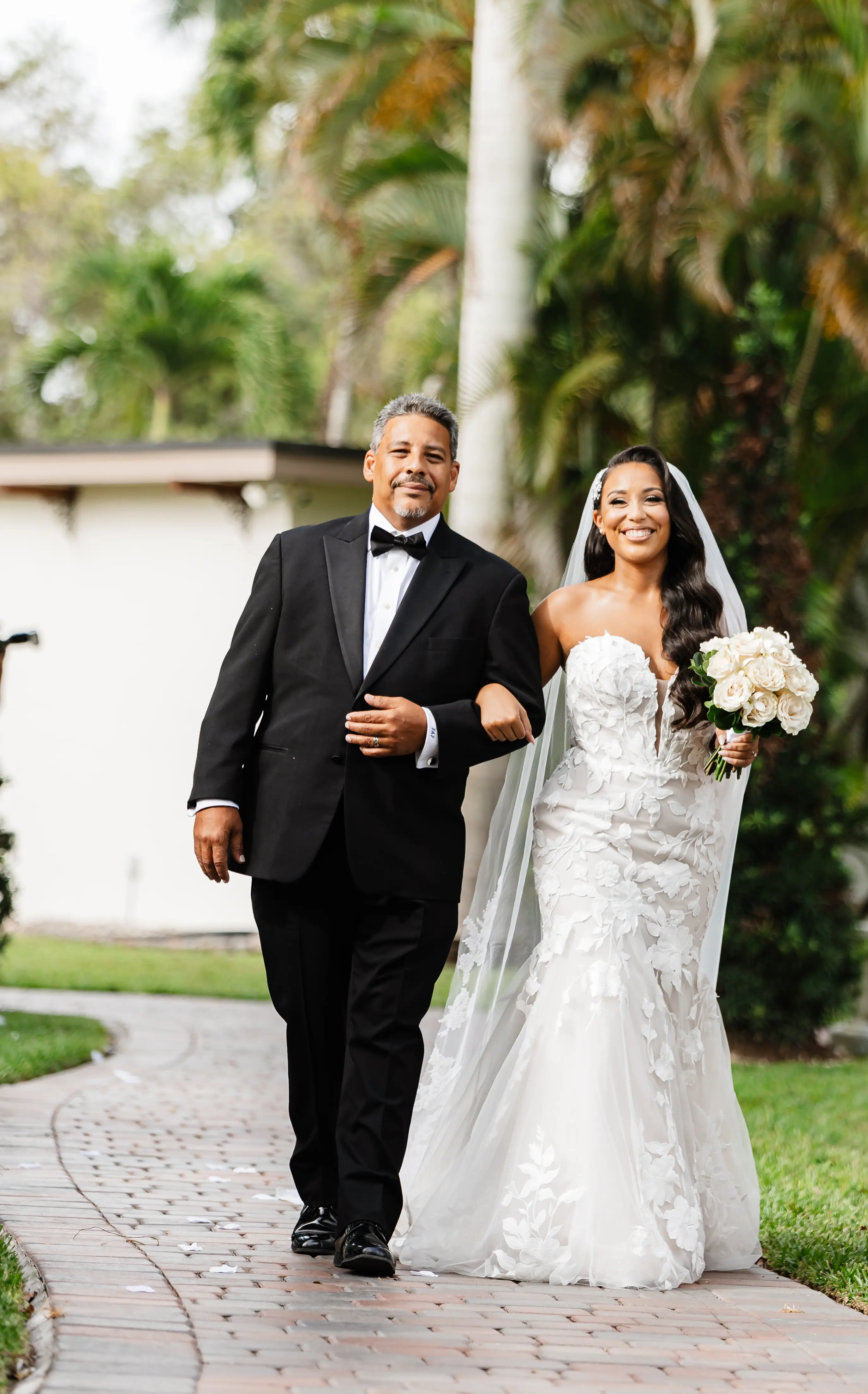 Real Bride in Strapless Mermaid Bridal Gown in Oversized Lace with Floral Lace Motifs over Sparkle Tulle and Sweetheart Neckline called Hattie by Rebecca Ingram