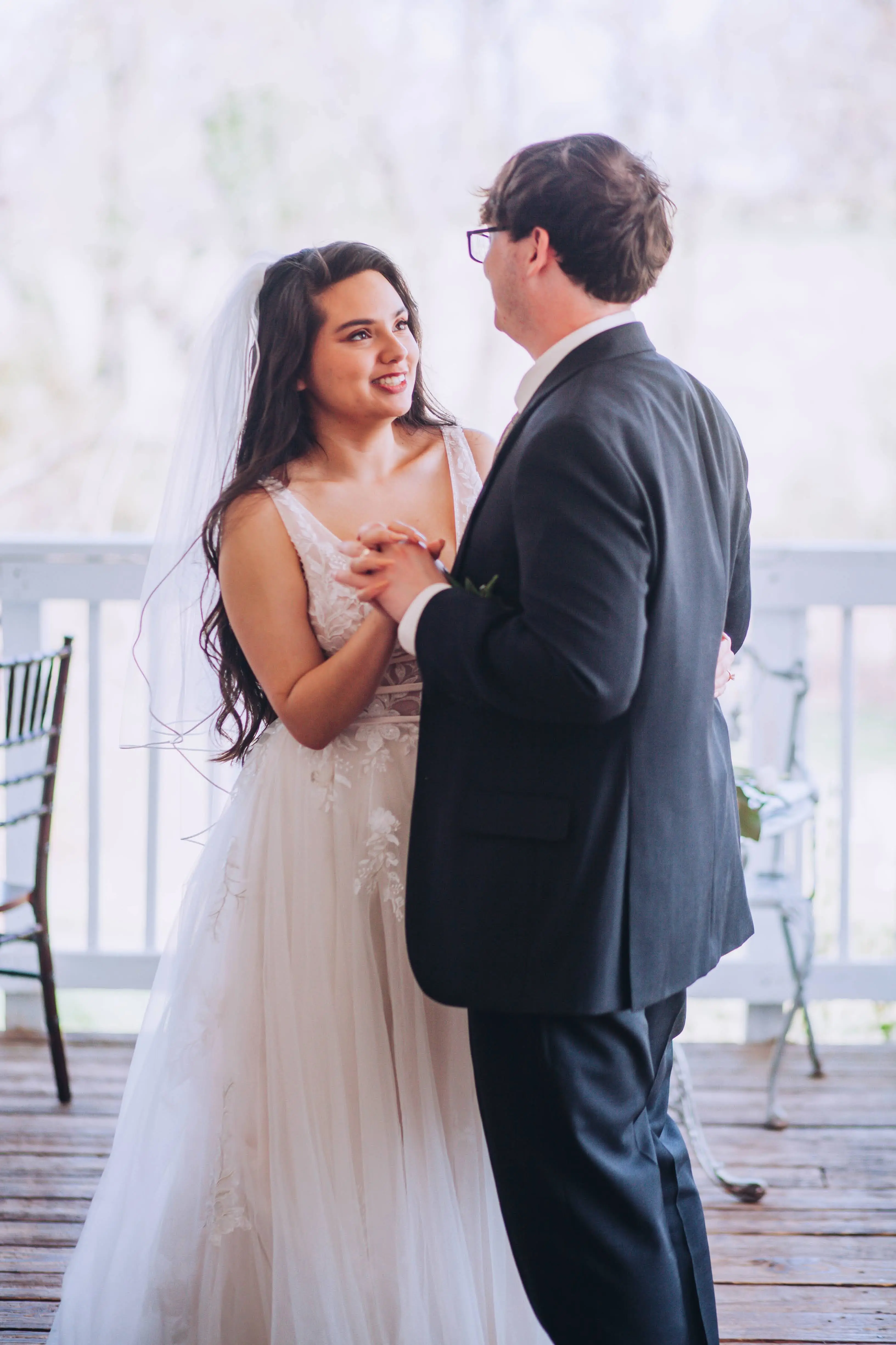 Groom With Bride Wearing Lace A-Line Wedding Dress Raelynn By Rebecca Ingram