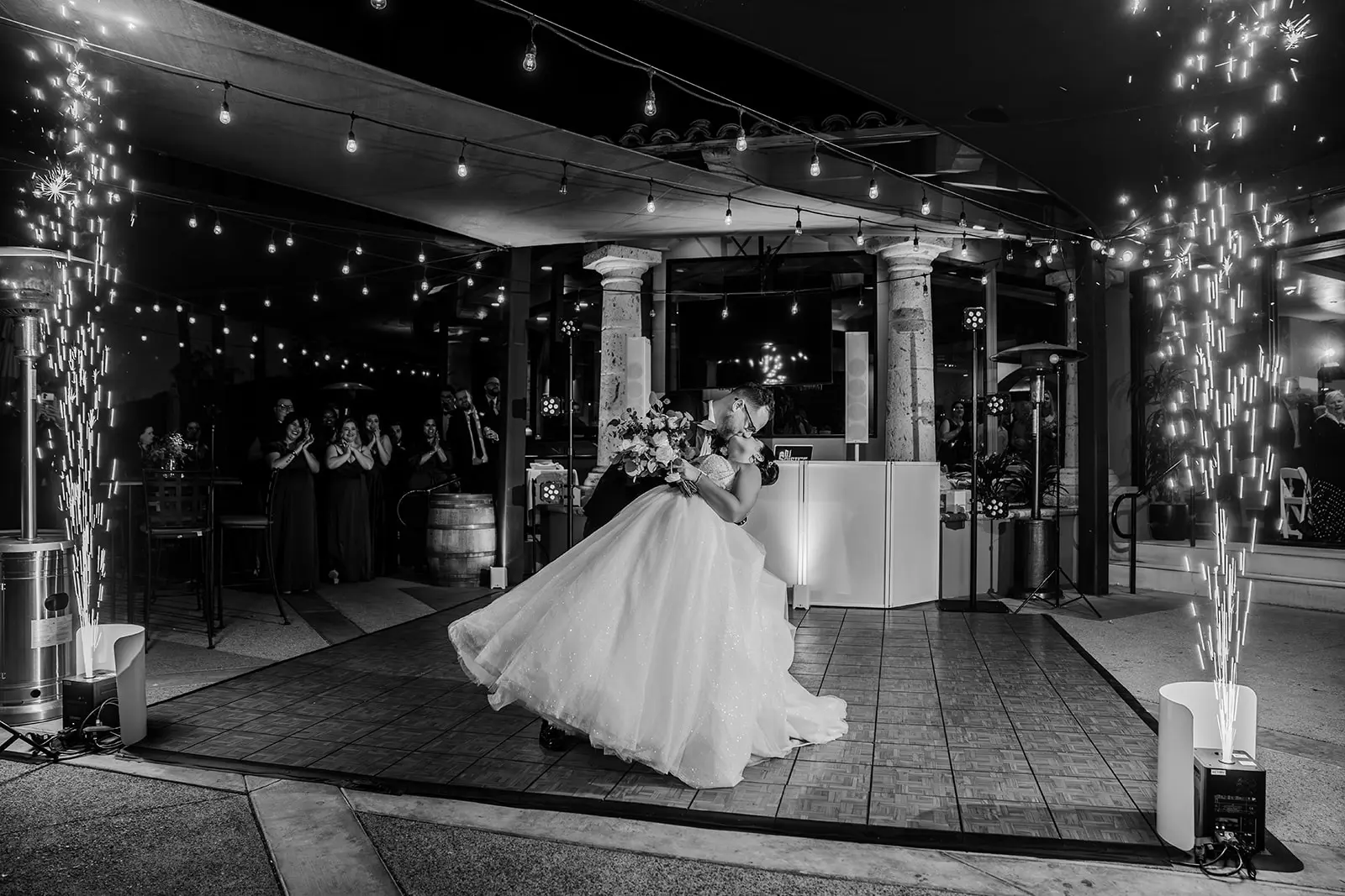 Bride Wearing Sparkly Princess Wedding Dress Called Elton By Sottero And Midgley Kissing Groom At The Reception