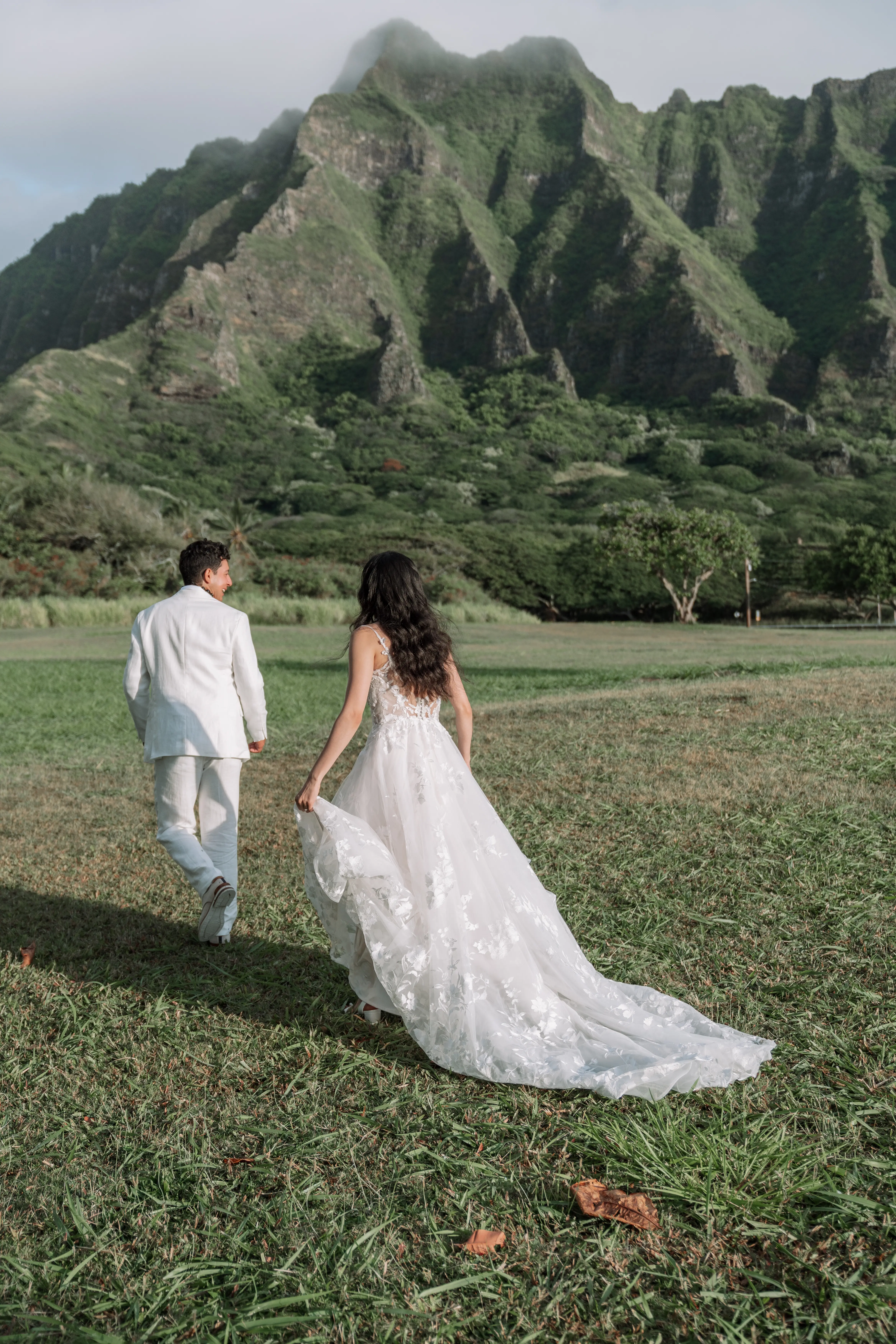 Bride wearing Winter wedding dress by Maggie Sottero follows her husband