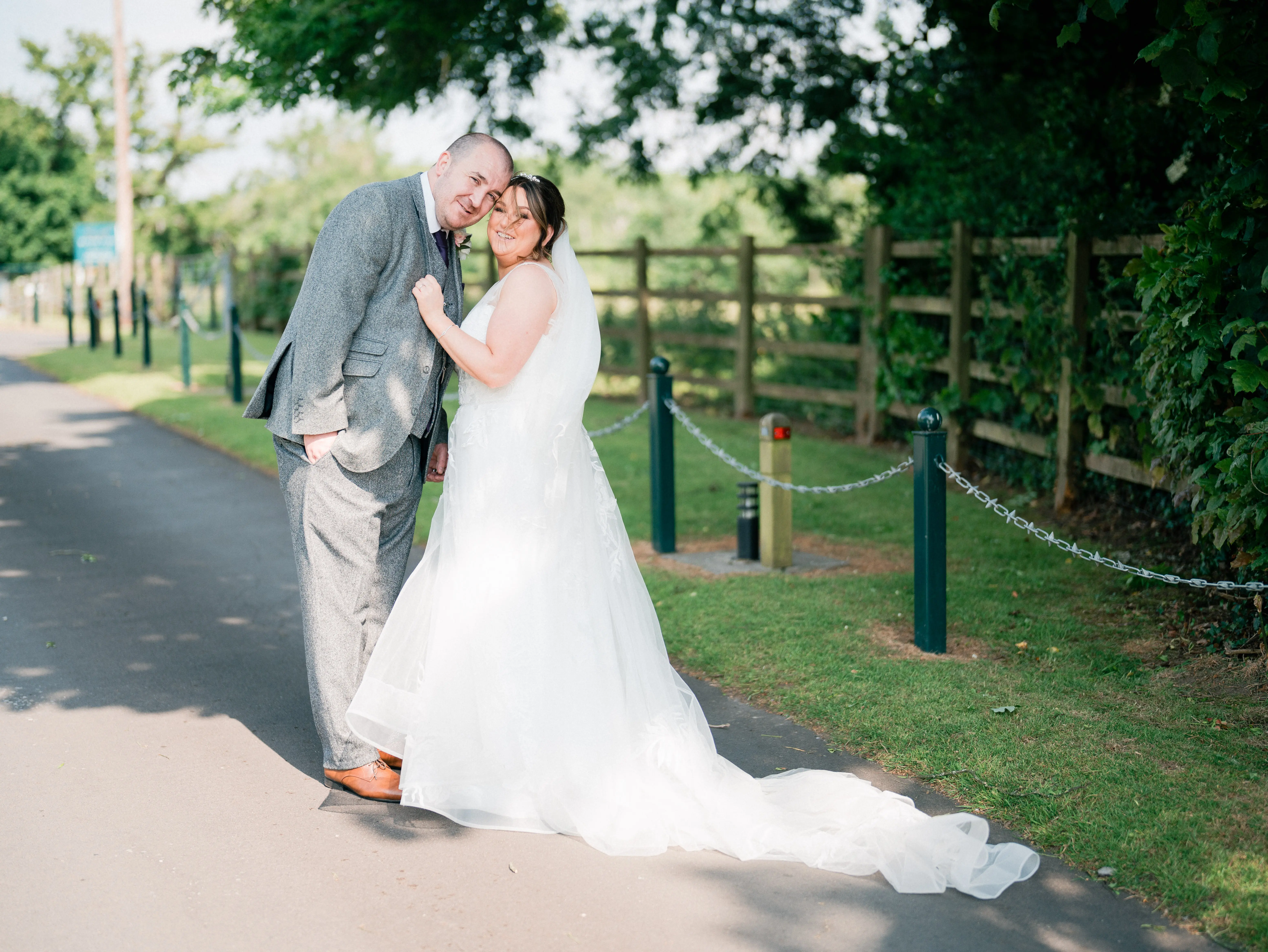 Real Bride in A-Line Wedding Gown with Lace Motifs Over Tulle and Beaded Lace Bodice Embellished with Swarovski Crystals Called Priscilla by Rebecca Ingram
