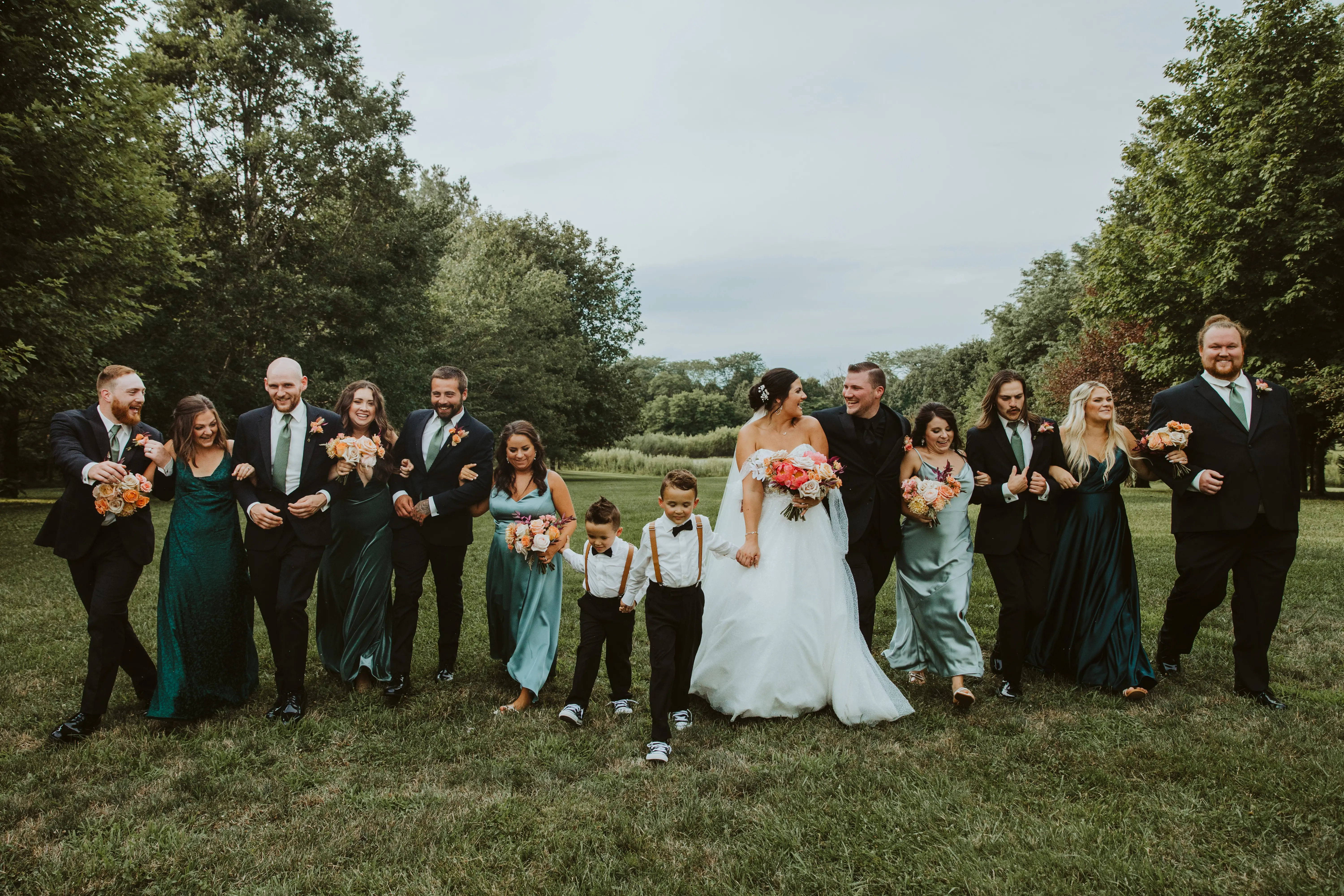 Bride Wearing Sparkly Ballgown Wedding Dress Called Shasha By Sottero And Midgley With Her Family And Bridal Party