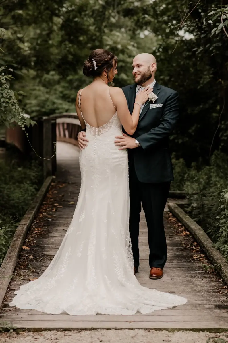 Bride and groom looking into each other's eyes.